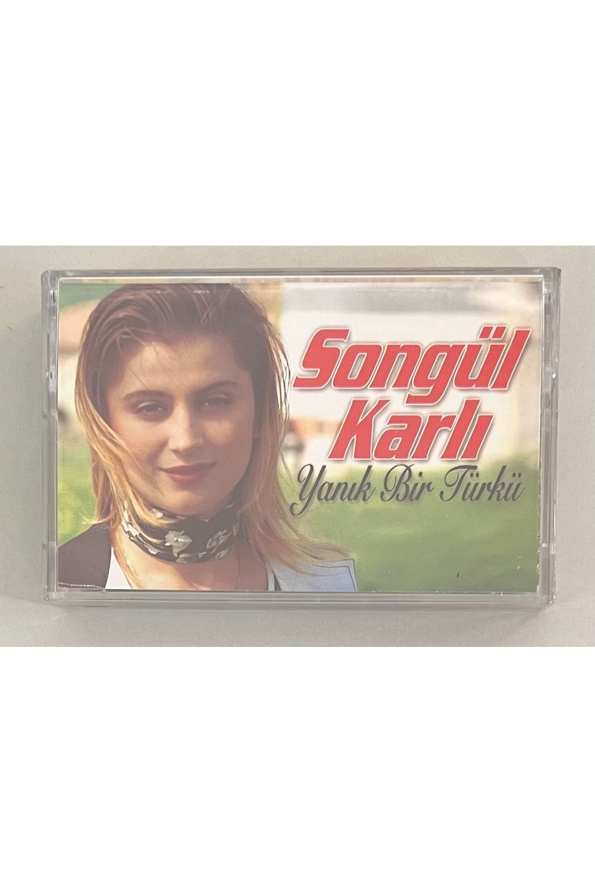 Plakevi İzmir Songül Karlı Yanık Bir Türkü Kaset (Jelatininde Sıfır Orjnal Dönem Baskı Kaset)