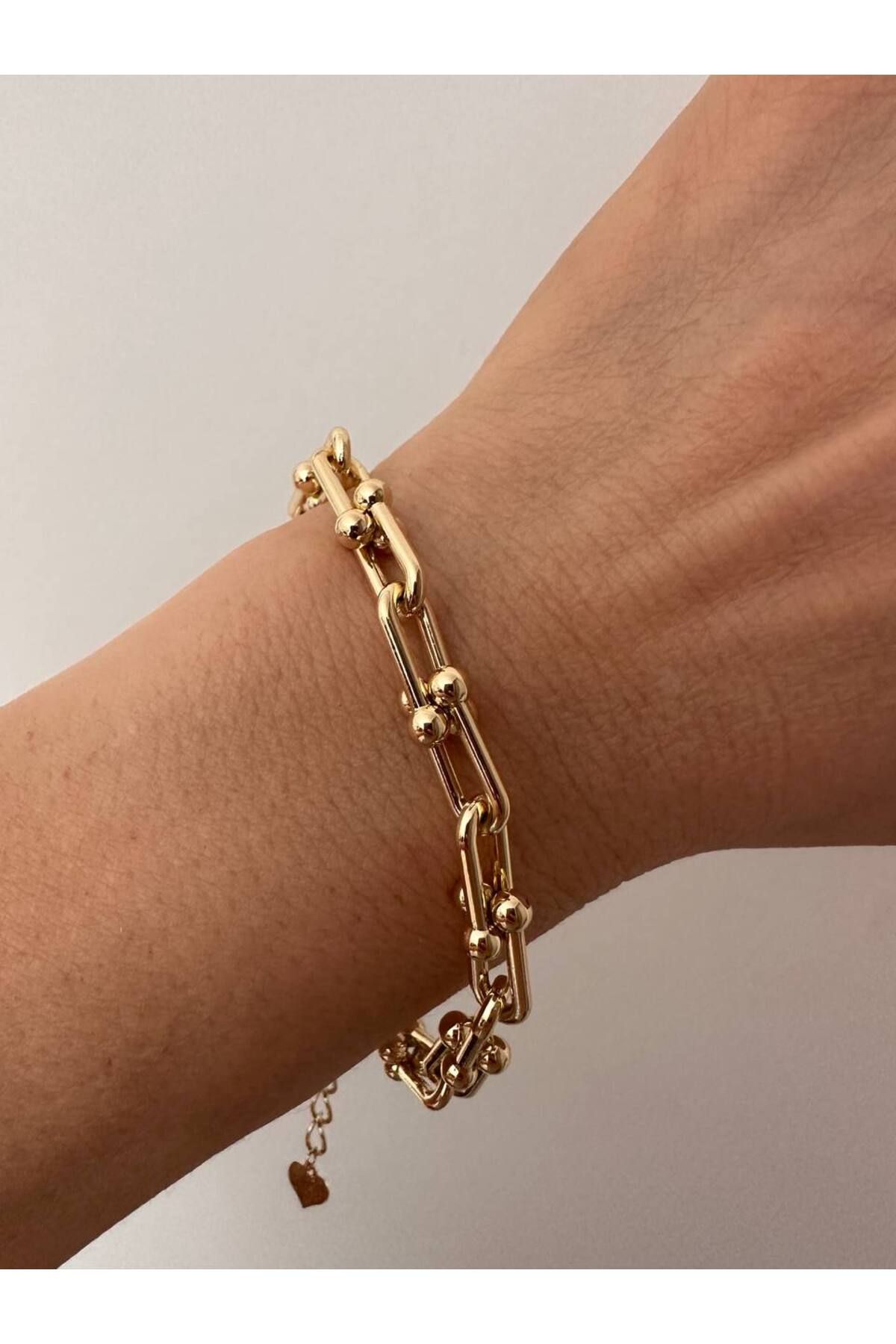 Esmeray Aksesuar Vip Çelik Gold Renk Marka Model Bileklik Uzunluk 19 cm. 23 cm.