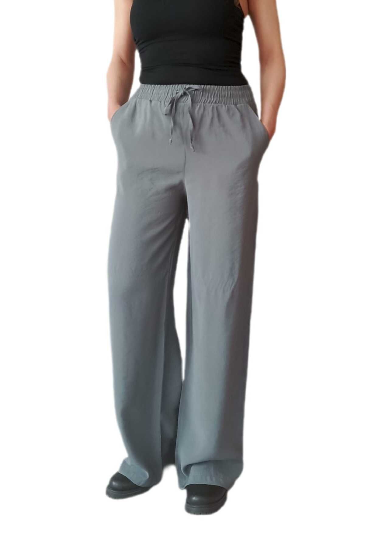 Butik BELİ LASTİKLİ RAHAT KALIP BOL PAÇA PANTOLON