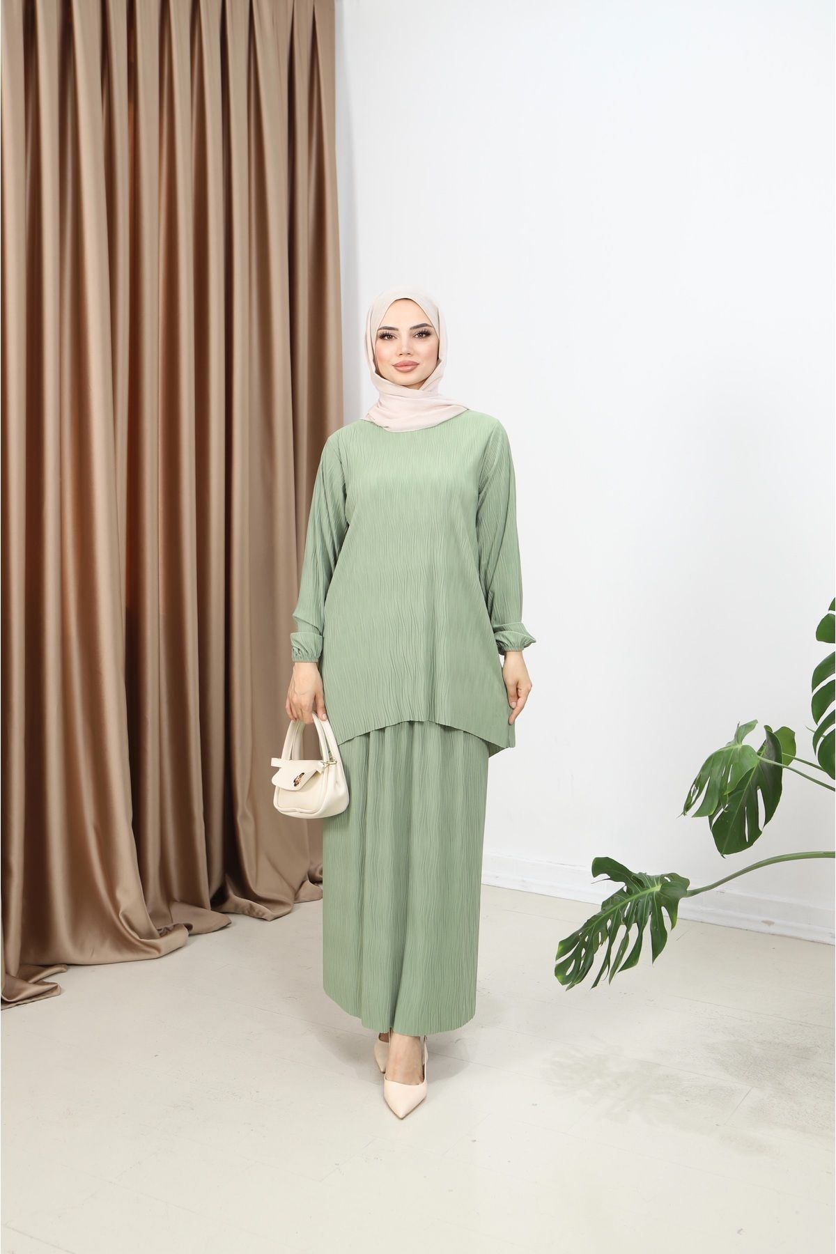 NİSUM MODA MANOLYA KIRAŞLI ETEKLİ TAKIM