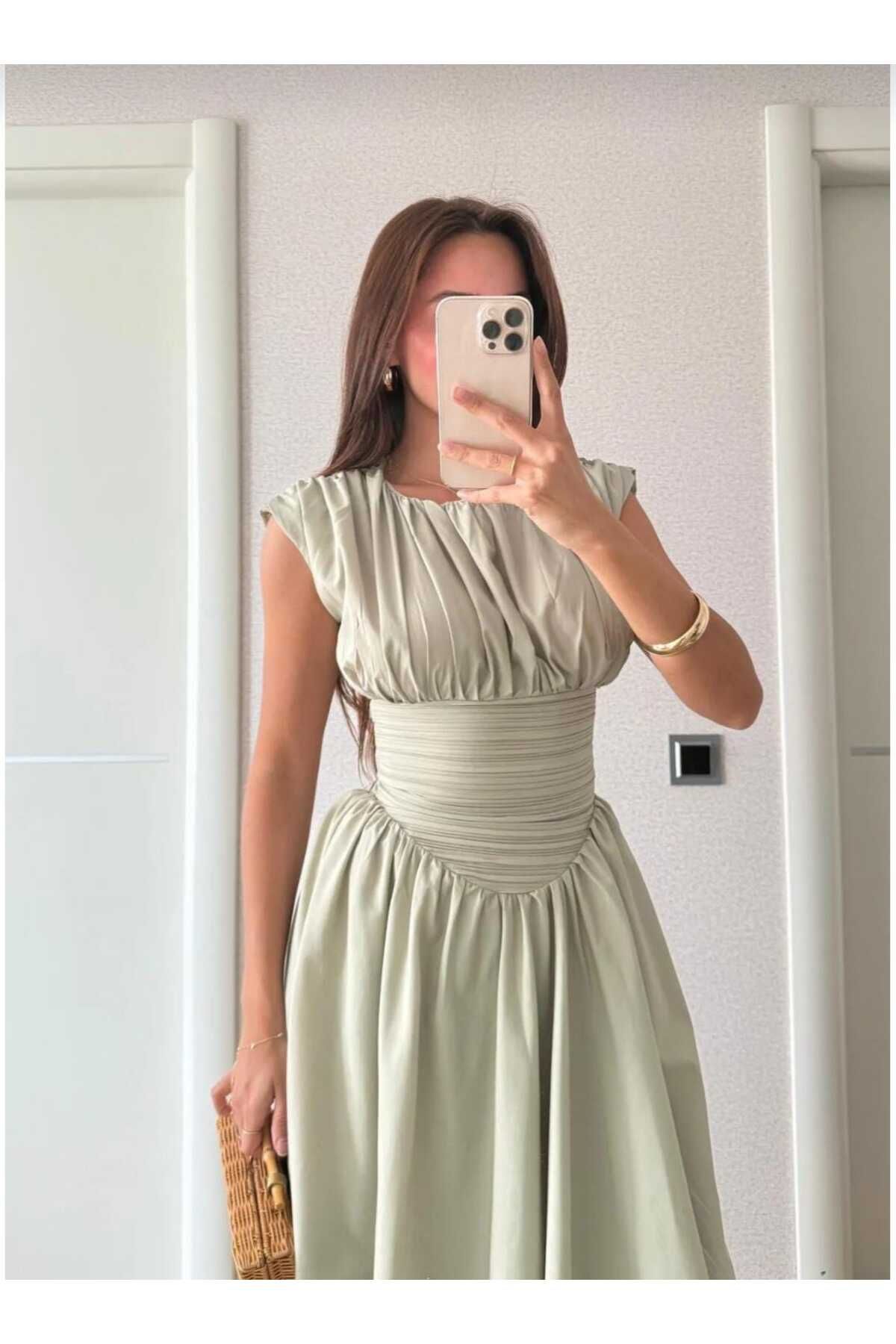 butik derin drapeli geniş çan etek beli büzgü tasarım kısa kollu bele oturan pinterest şık muadil midi elbise