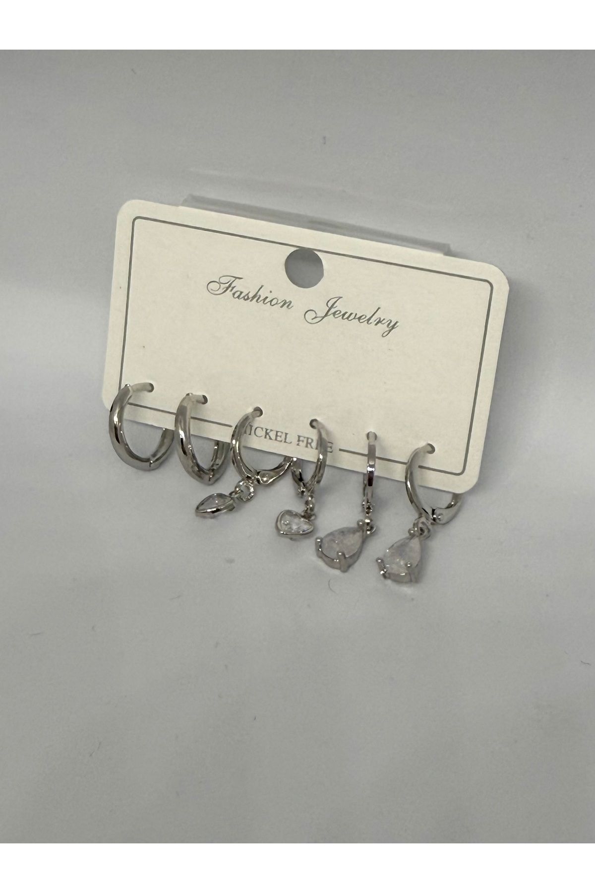 Gulsah's Store Zirkon taşlı silver beyaz damla model kalp detyalı 3'lü küpe seti