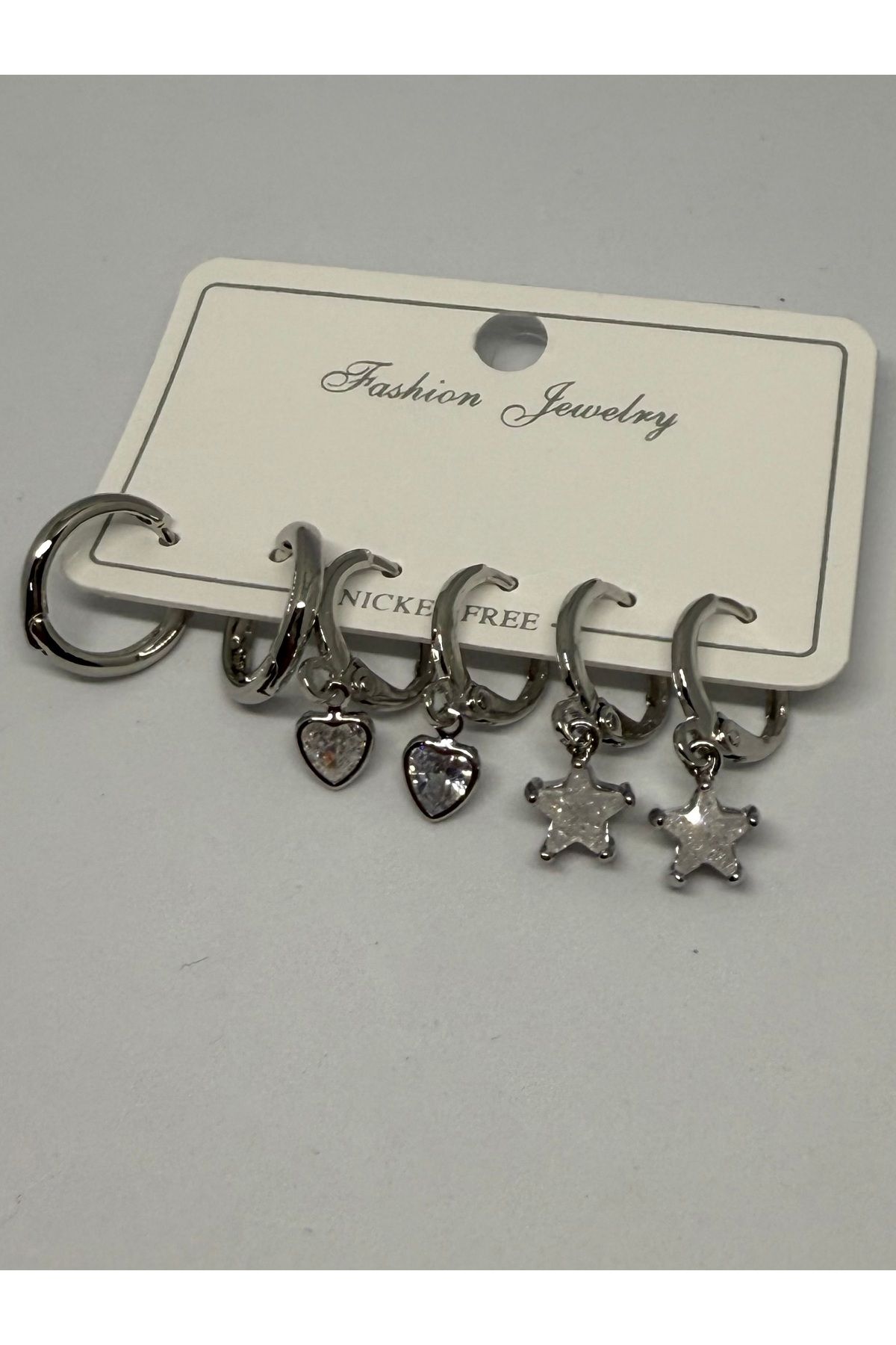 Gulsah's Store Zirkon taşlı silver yıldız detaylı 3'lü küpe seti