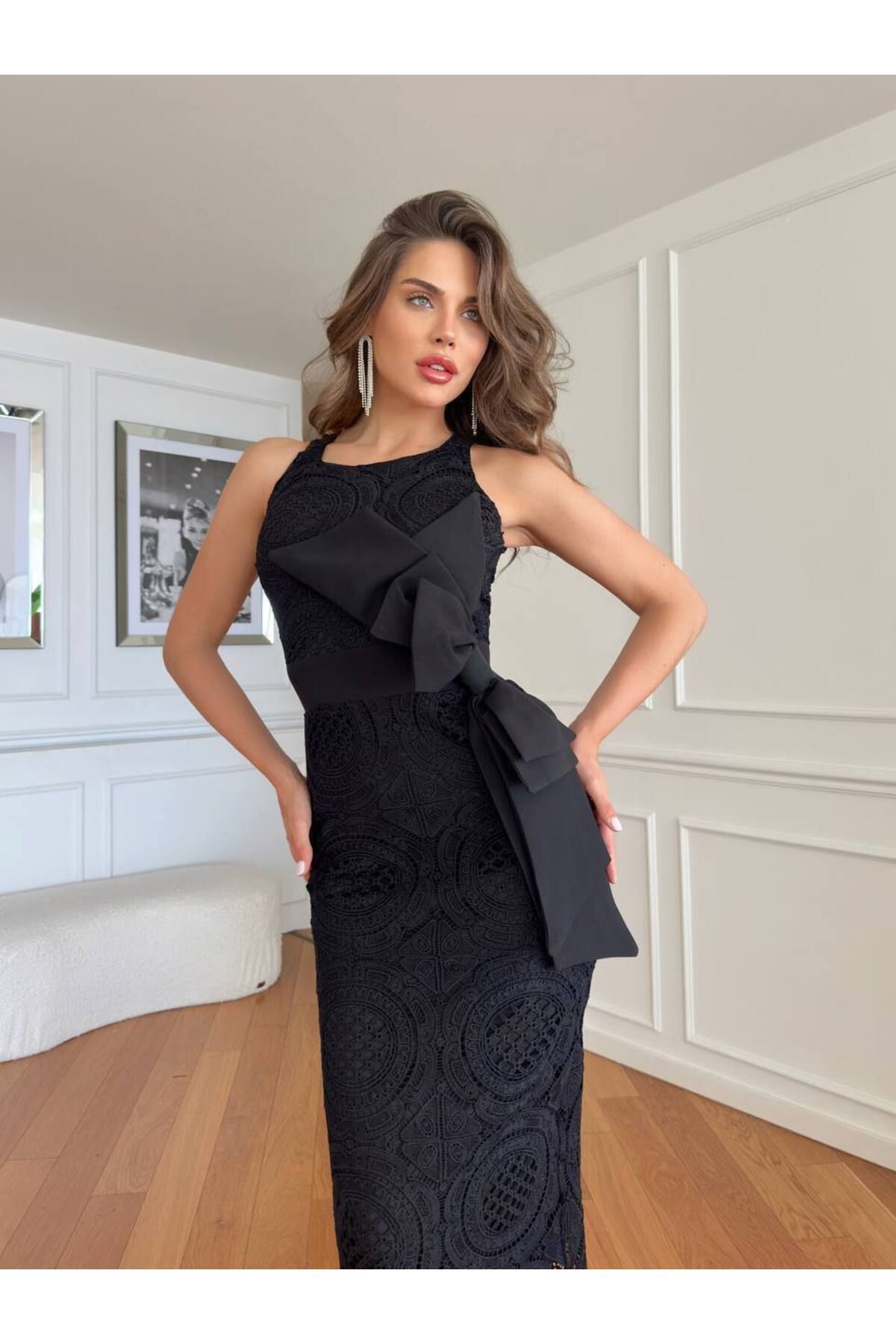 369 etnik butik Midi boy, dantel işlemeli gövde, belde büyük fiyonk detaylı "Bow‑Detail Lace Midi Dress".