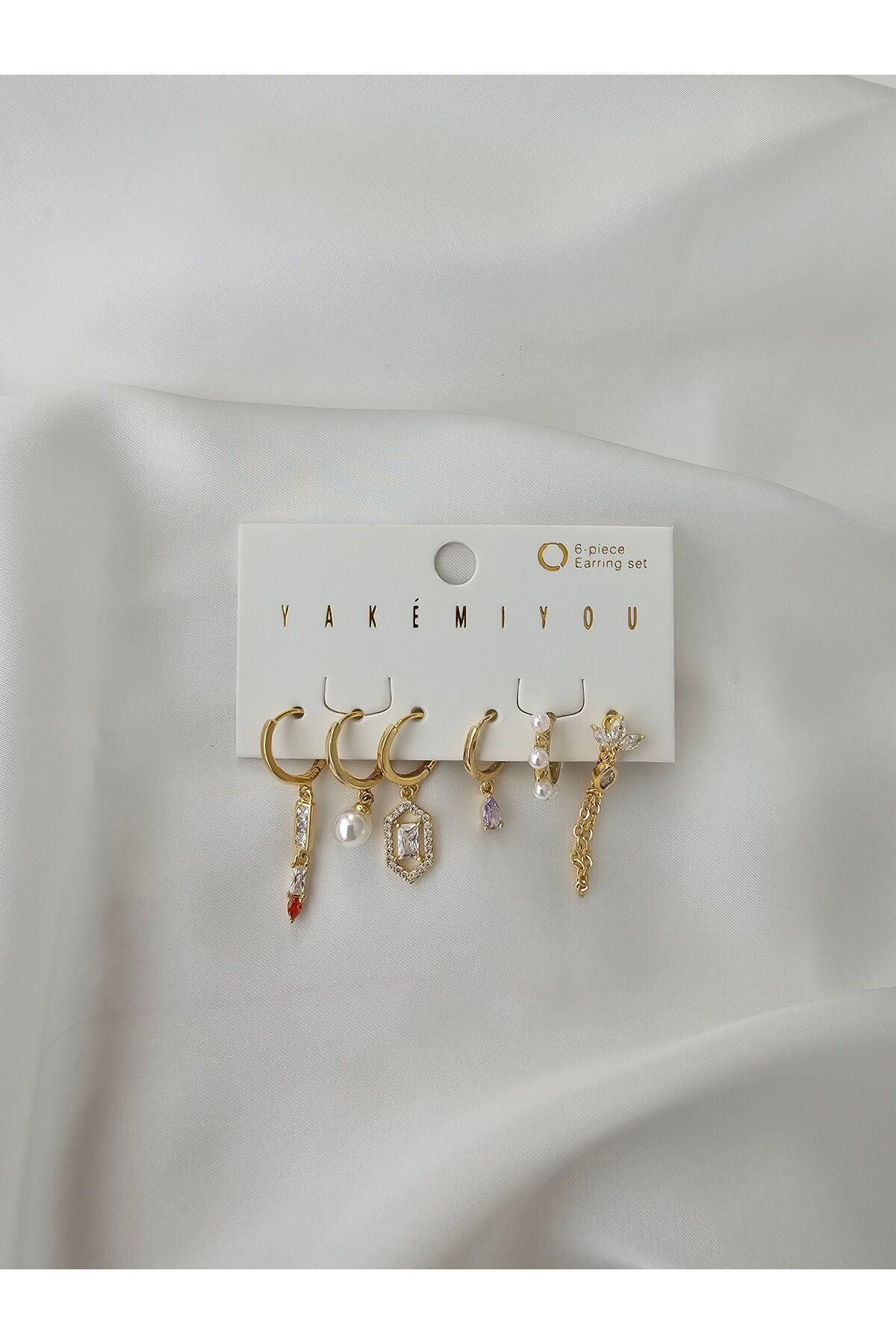 Zivazer Store kadın çelik kararmaz 6lı taşlı gold renkli minik halkalı küpe