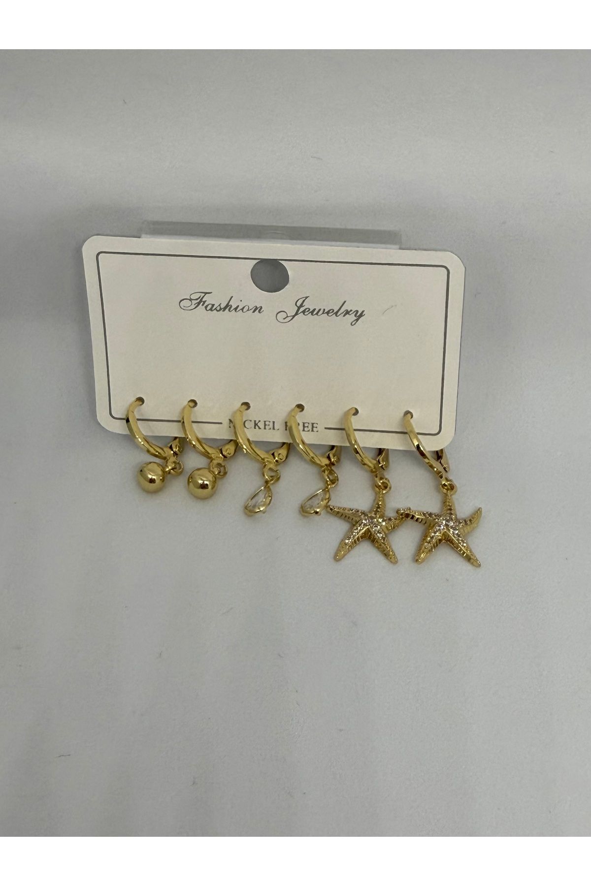 Gulsah's Store Zirkon taşlı deniz yıldızı detaylı 3'lü küpe seti