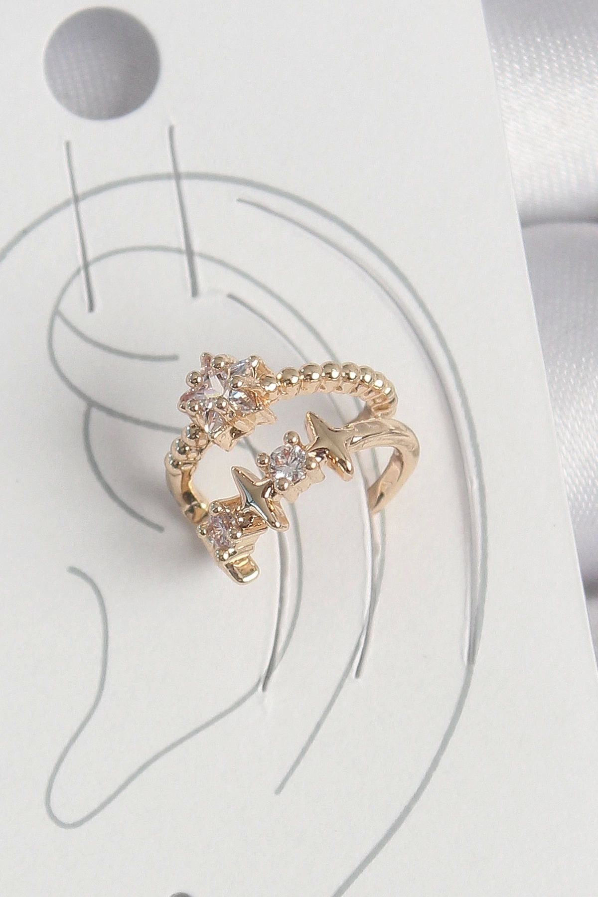 Clariss Pirinç Gold Renk Zirkon Taşlı Yıldız Model Kadın Kıkırdak Küpe