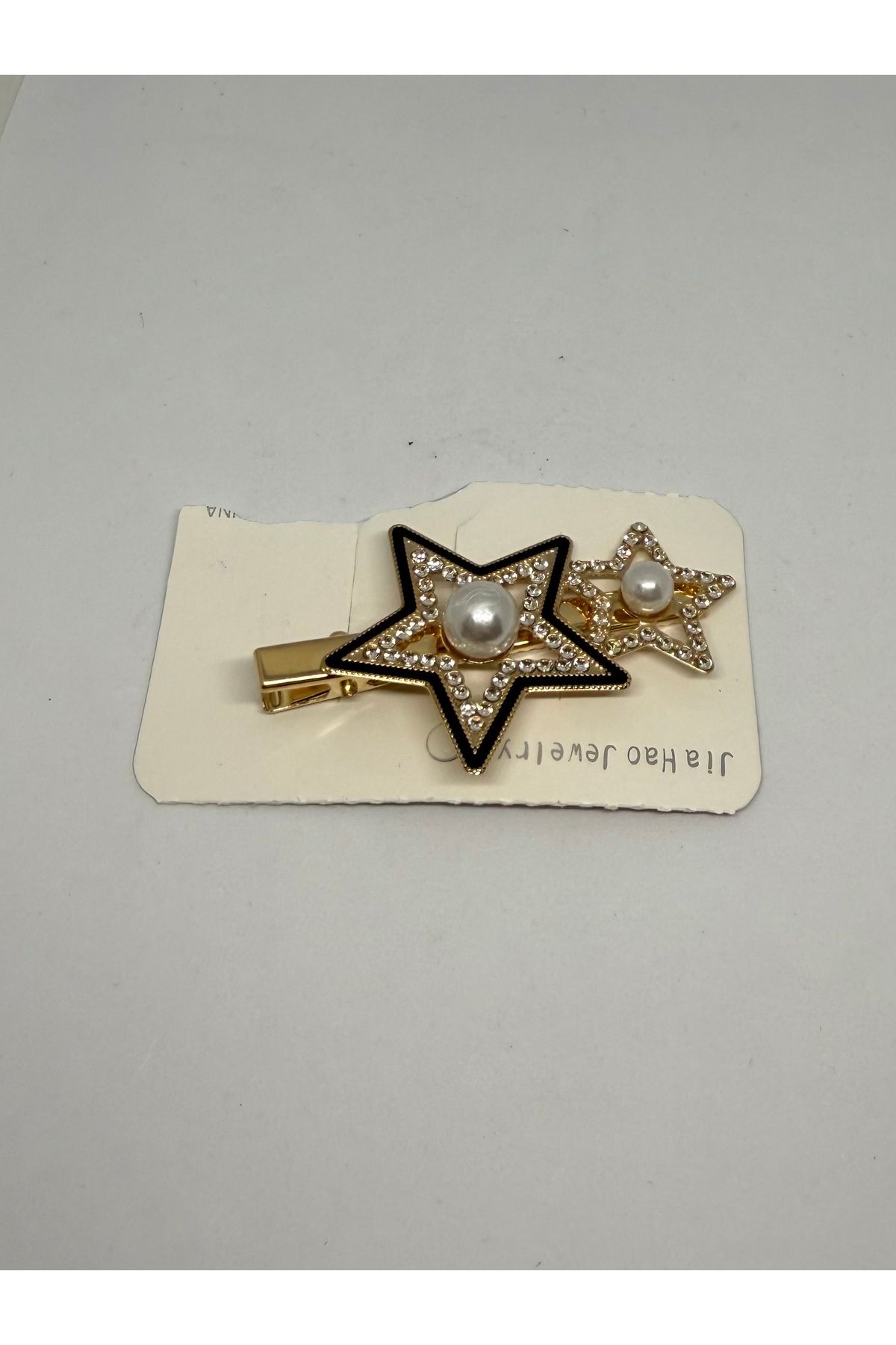 Gulsah's Store Zirkon taş ve inci detaylı yıldız figürlü siyah-gold pensli toka