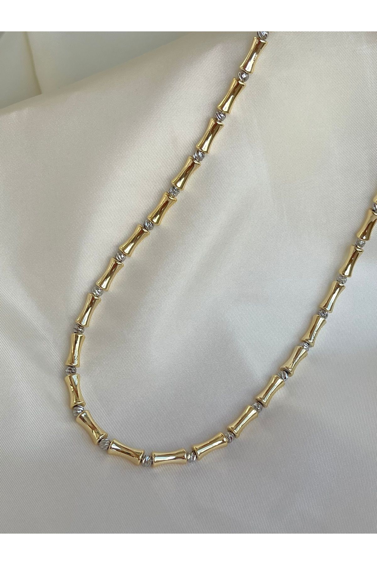 Twinssis Accessories Dorika Detaylı Kemik Model Kolye