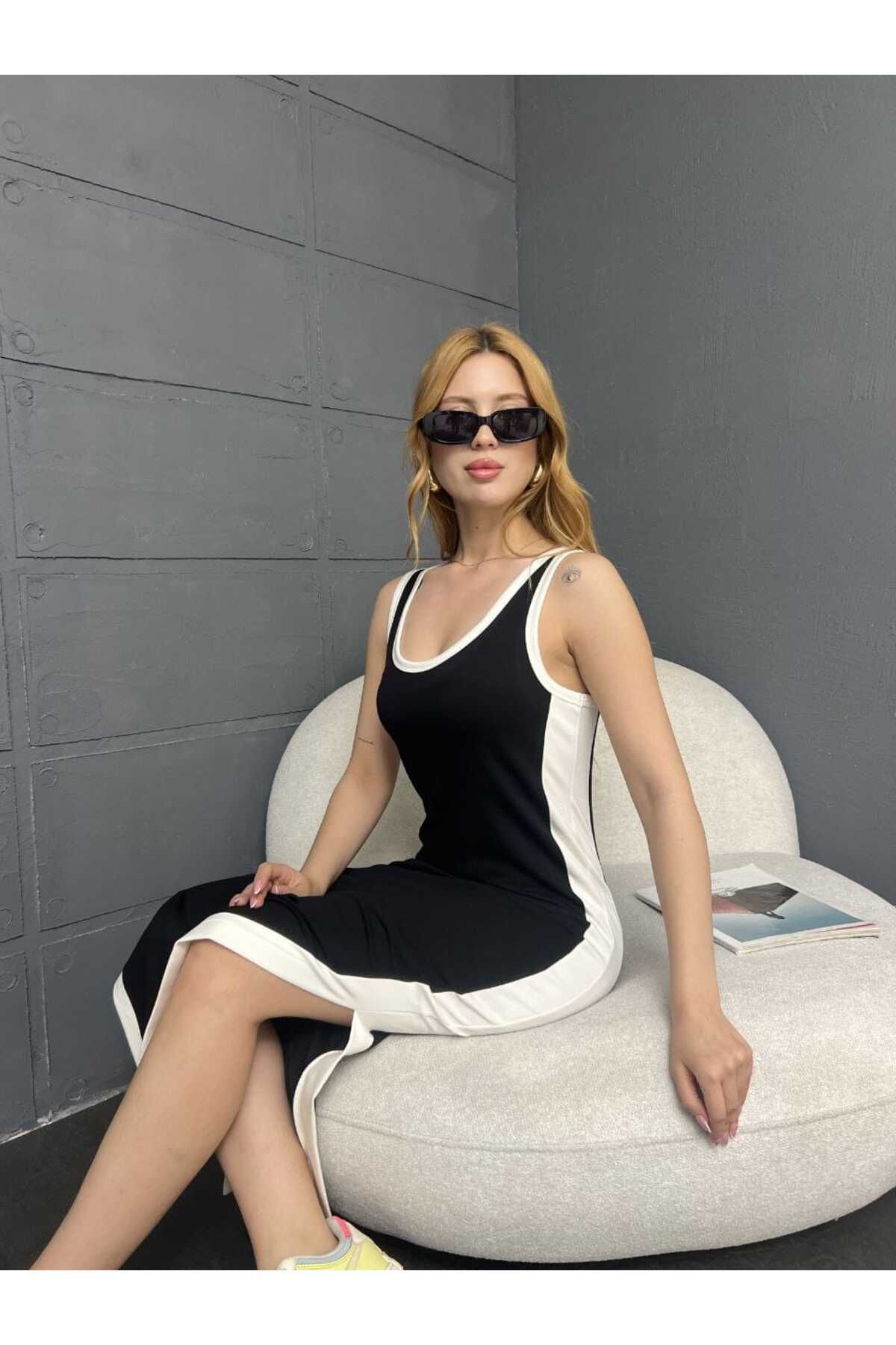Butik merrline kadın yandan şeritli garnili yumuşak kumaş yırtmaçlı premium spor elbise