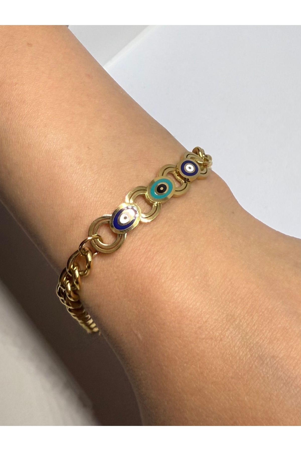 Gulsah's Store Çelik gold nazar boncuk figürlü bileklik