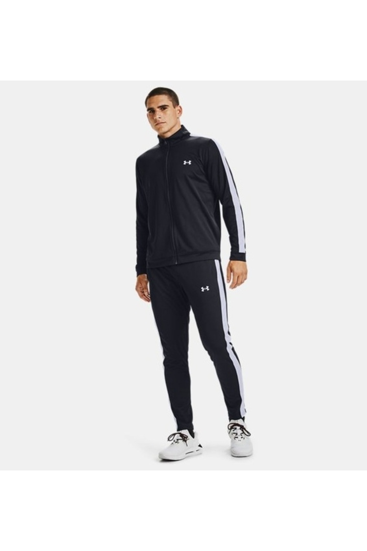 آندر آرمور ۱۳۵۷۱۳۹-لباس ورزشی بافتنی UA، یقه زیپ‌دار، کمر بسته، مشکی - سفید، لباس ورزشی مردانه