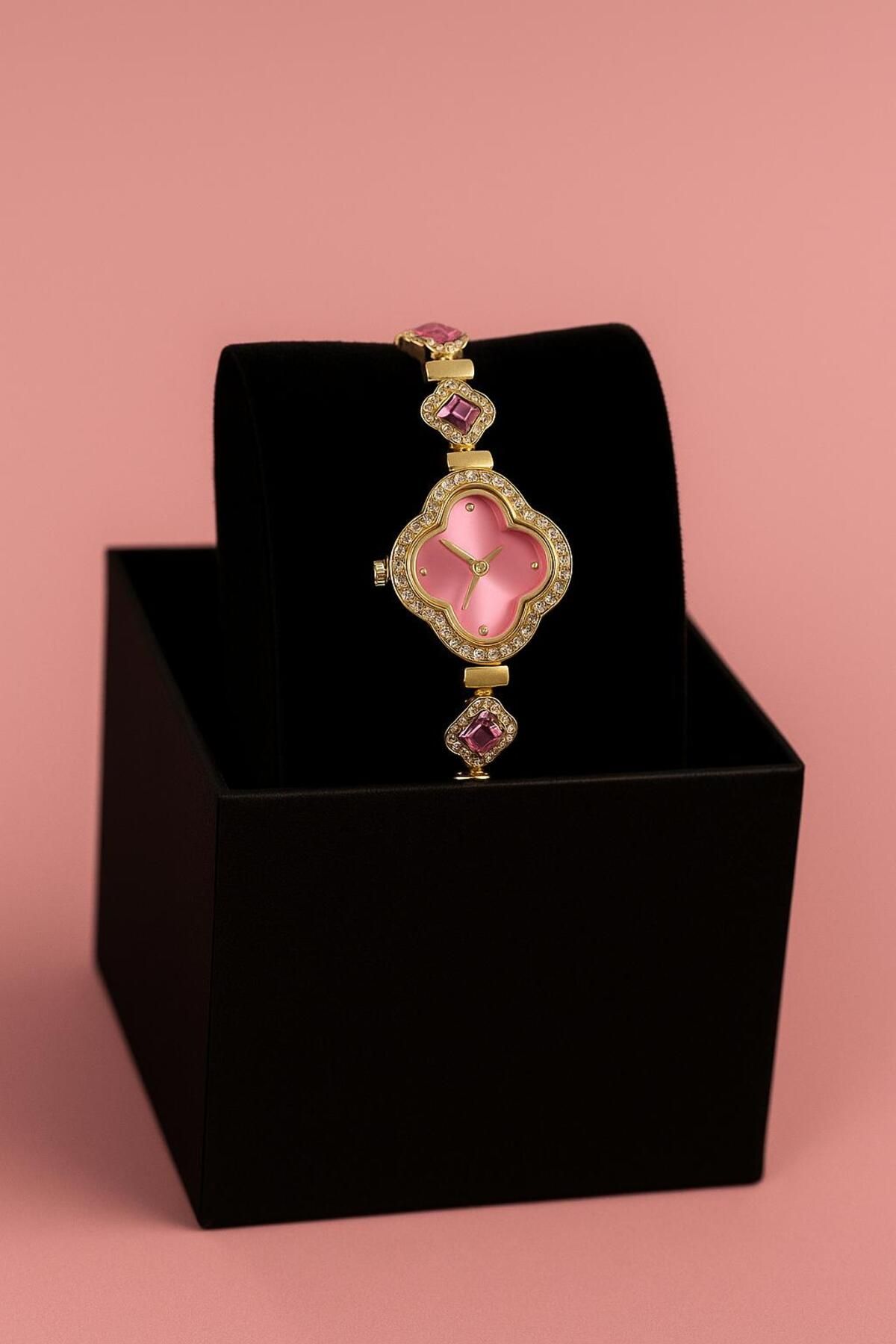 moda paketi PEMBE TAŞ DETAYLI GOLD ZARİF KADIN KOL SAATİ