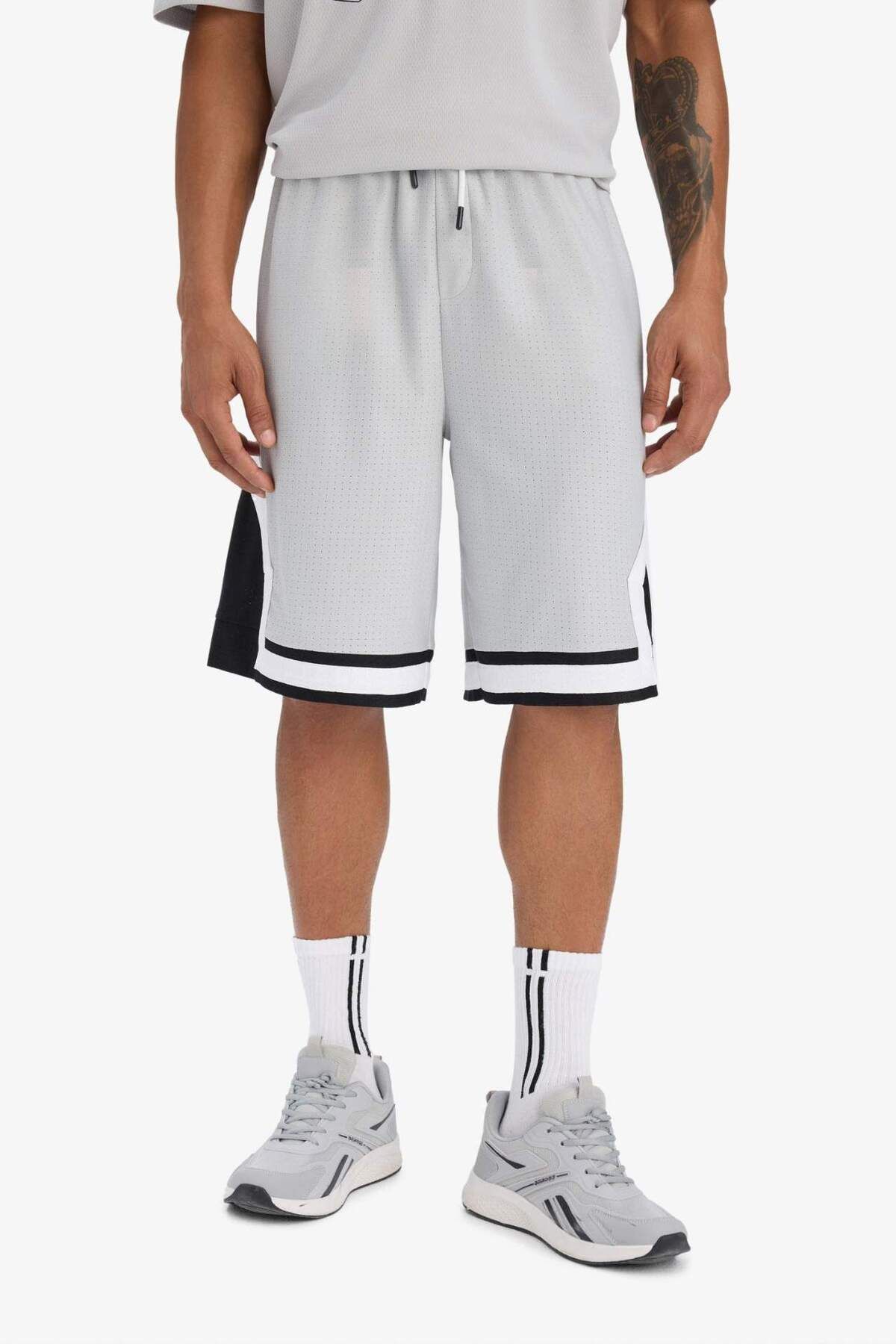 DeFacto DeFactoFit Hızlı Kuruyan Oversize Geniş Kalıp Sporcu Kısa Paça Şort E4128AX25SM