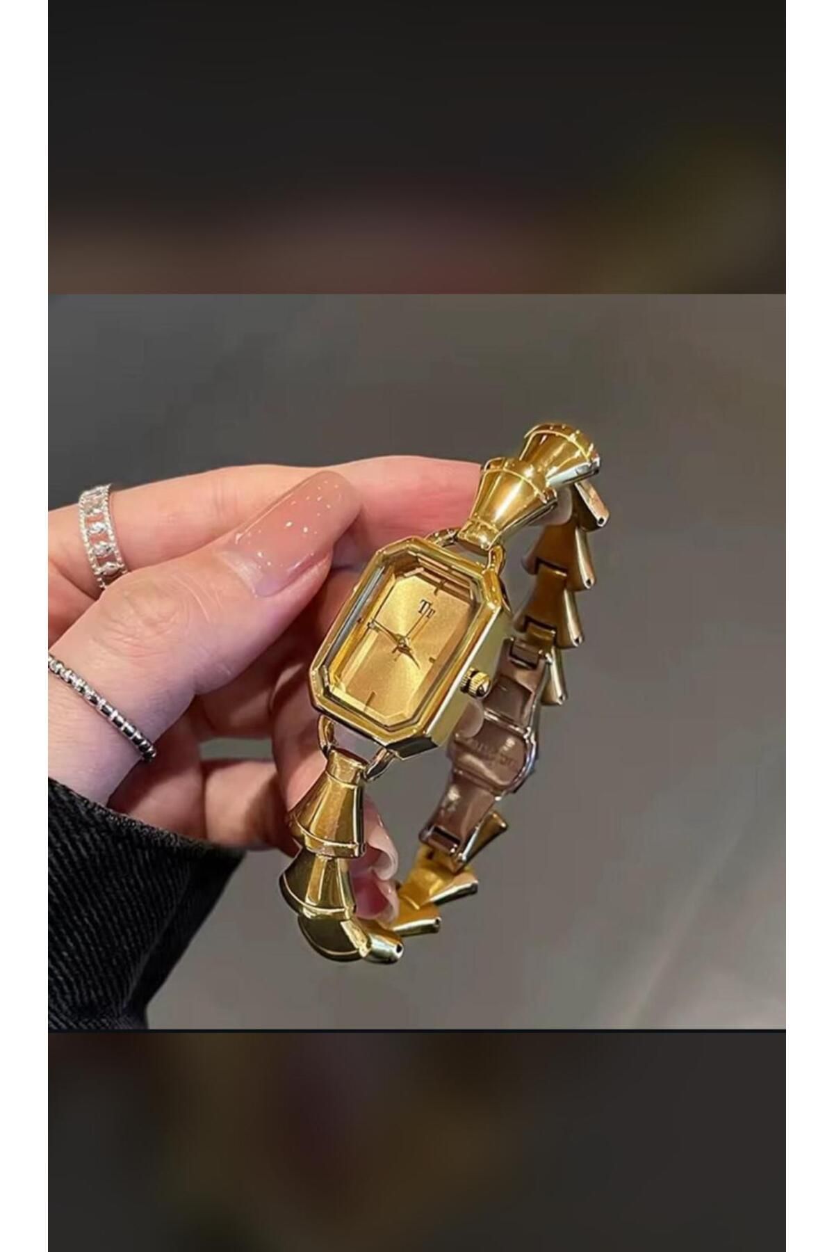 MUMMY CANDLE Kadın Gold Çelik Model Şık Saat