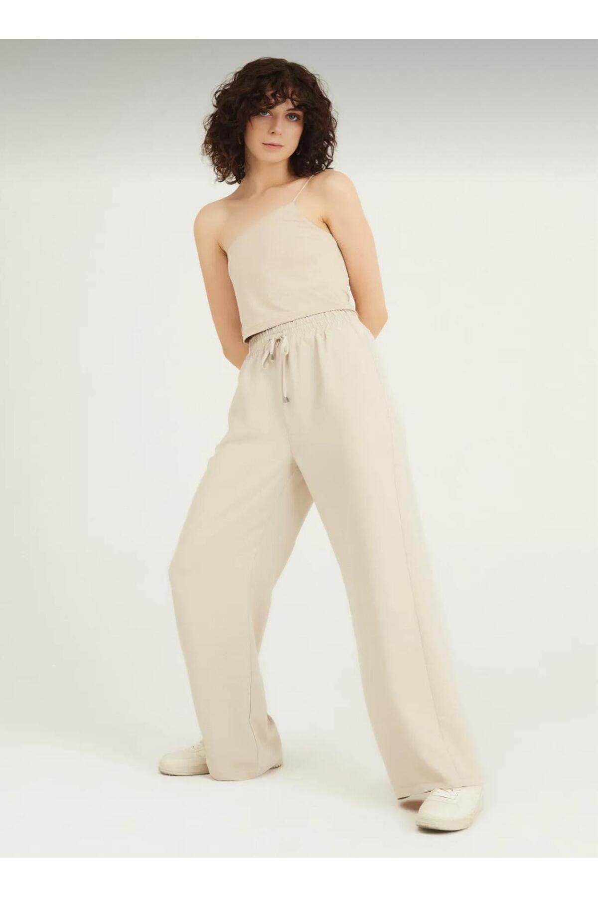 MODA BELİ LASTİKLİ BOL PAÇA TAŞ RENGİ PANTOLON