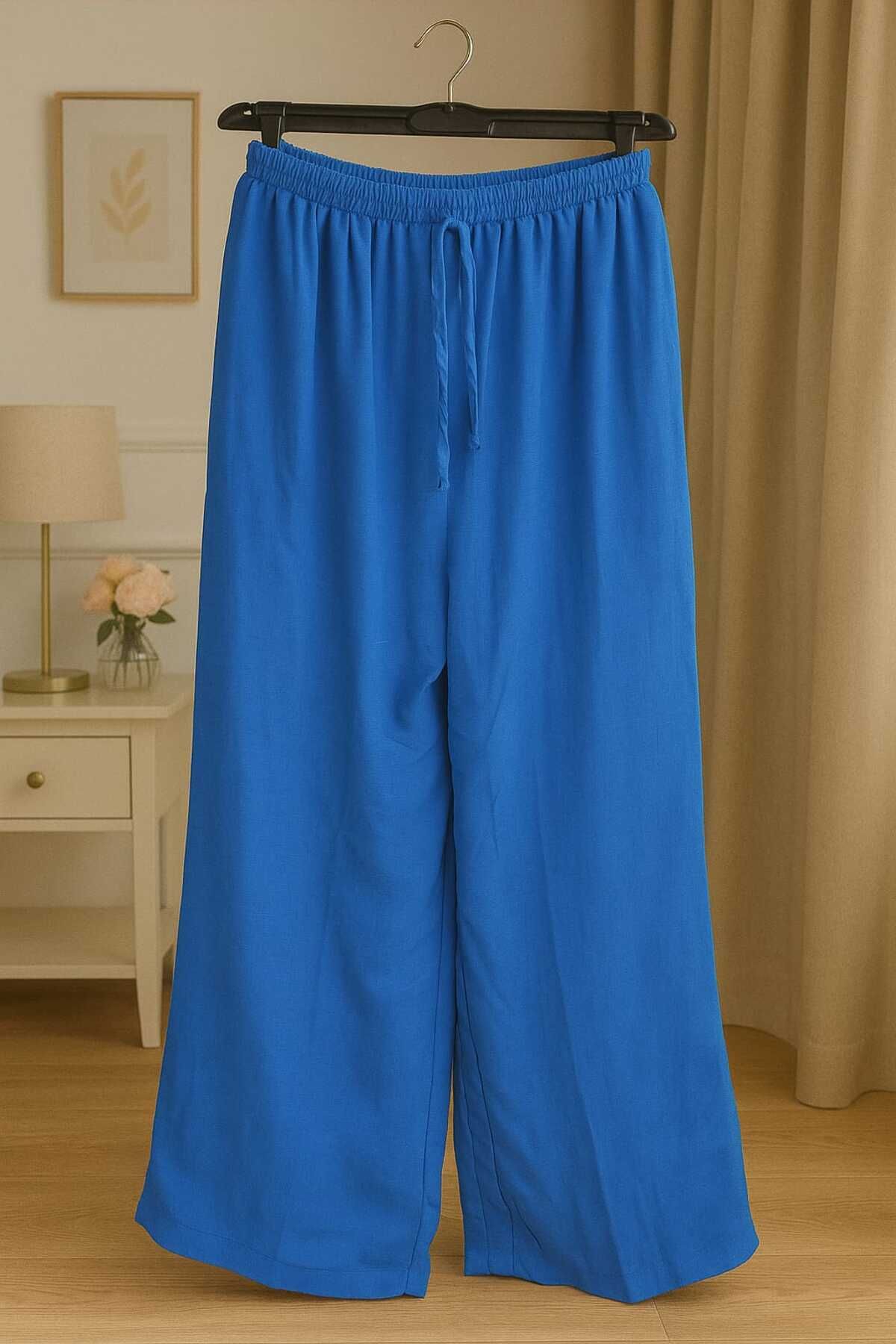MU PRATOR kadın beli lastikli bol paça saten pantolon