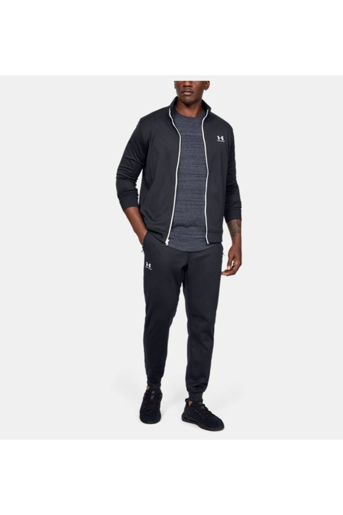 آندر آرمور شلوار ورزشی مردانه گشاد مشکی - سفید 1290261-001-SPORTS