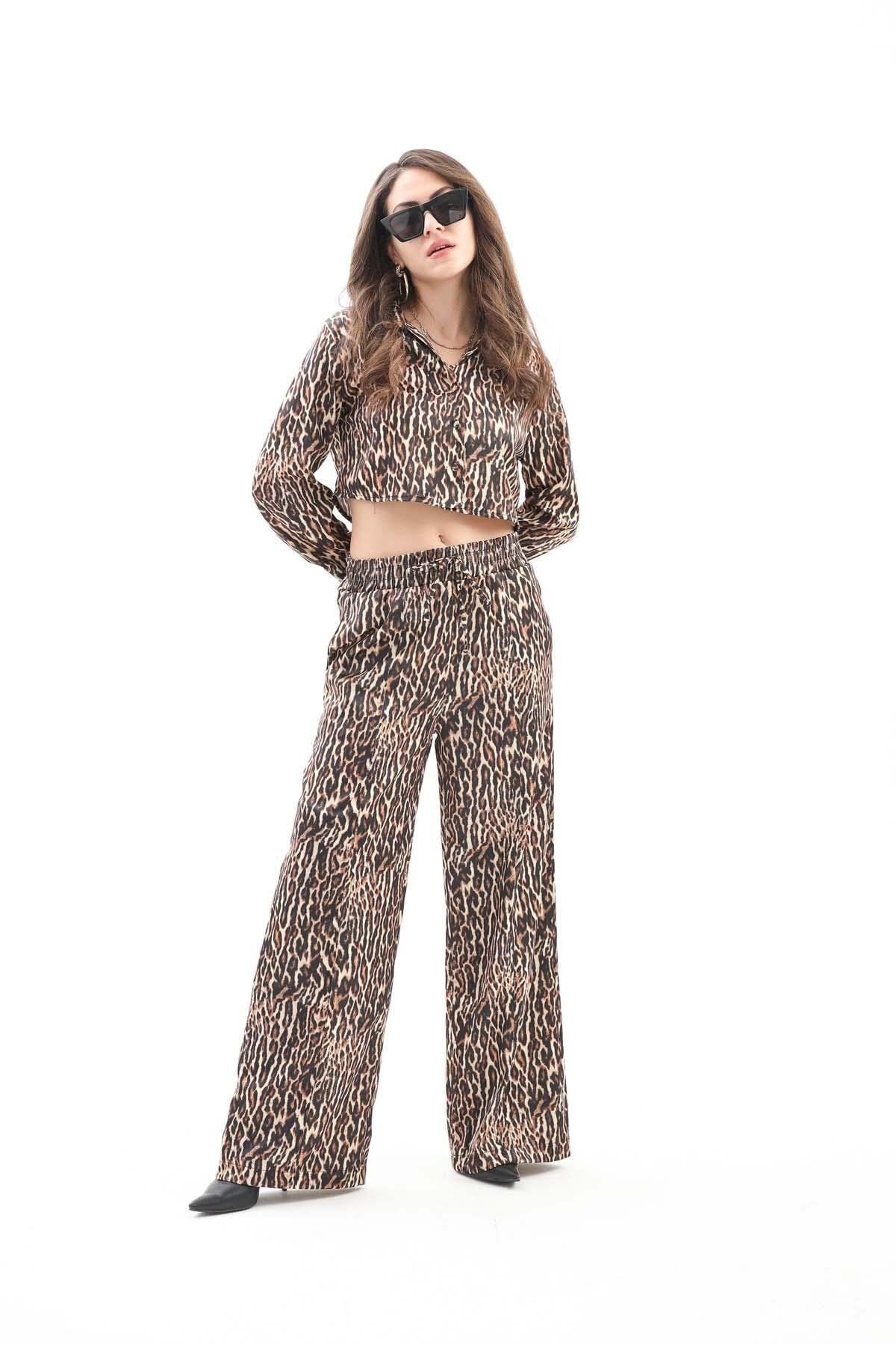 NOSTALJİX Önü Çimalı Beli Lastikli Leopar Desen Pantolon - Siyah