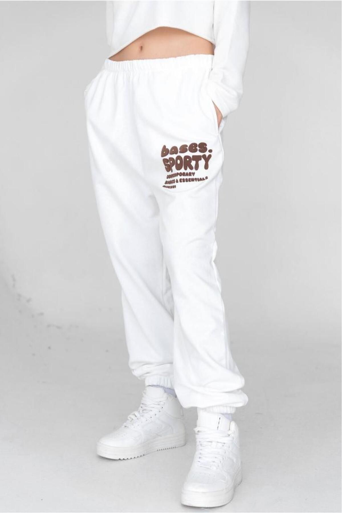 bases.-Jogger de damă cu talie ecru imprimat elastic 5