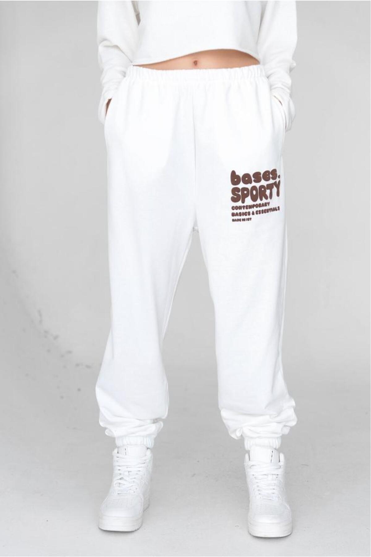 bases.-Jogger de damă cu talie ecru imprimat elastic 2