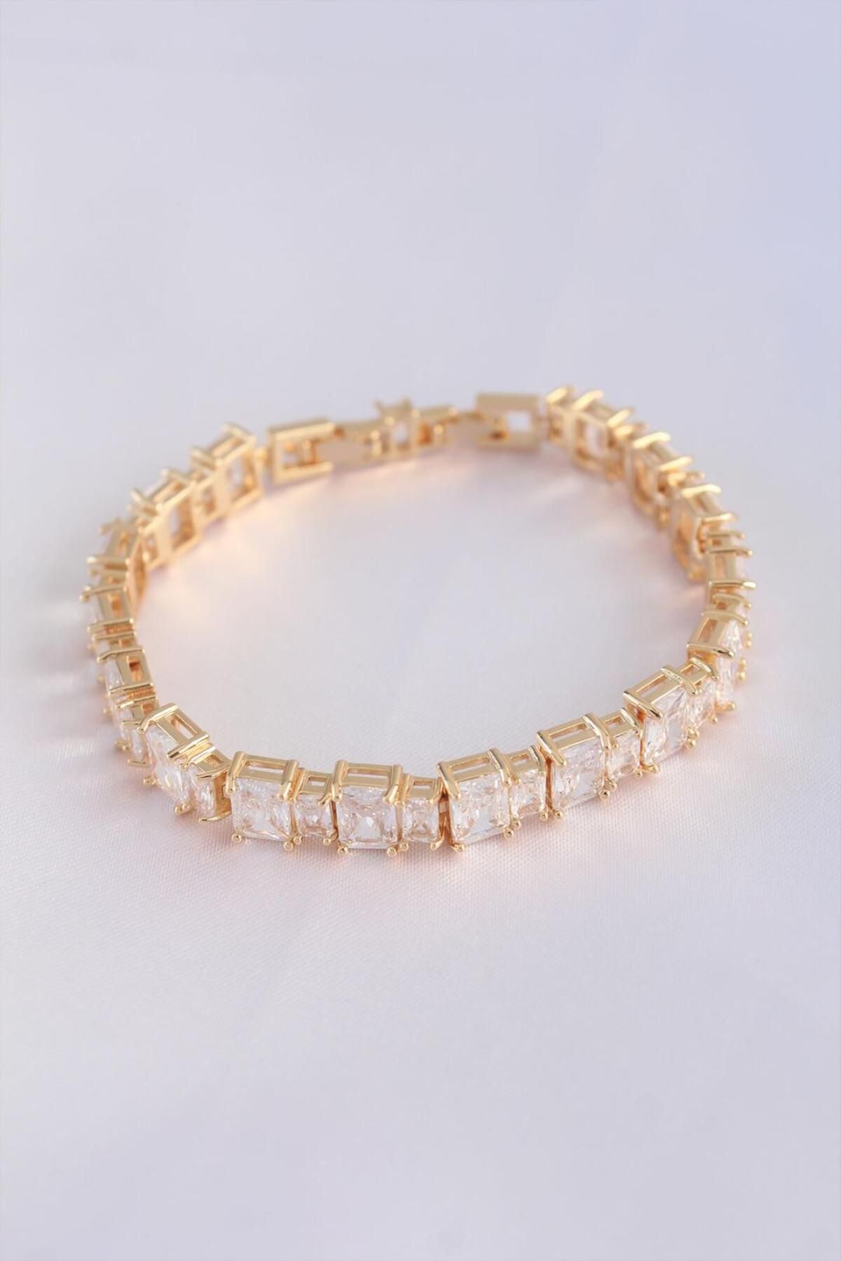AfraBeauty Vip Seri 925 Ayar Paslanmaz Çelik Zirkon Taşlı Gold Renk Baget Su Yolu Model Bileklik