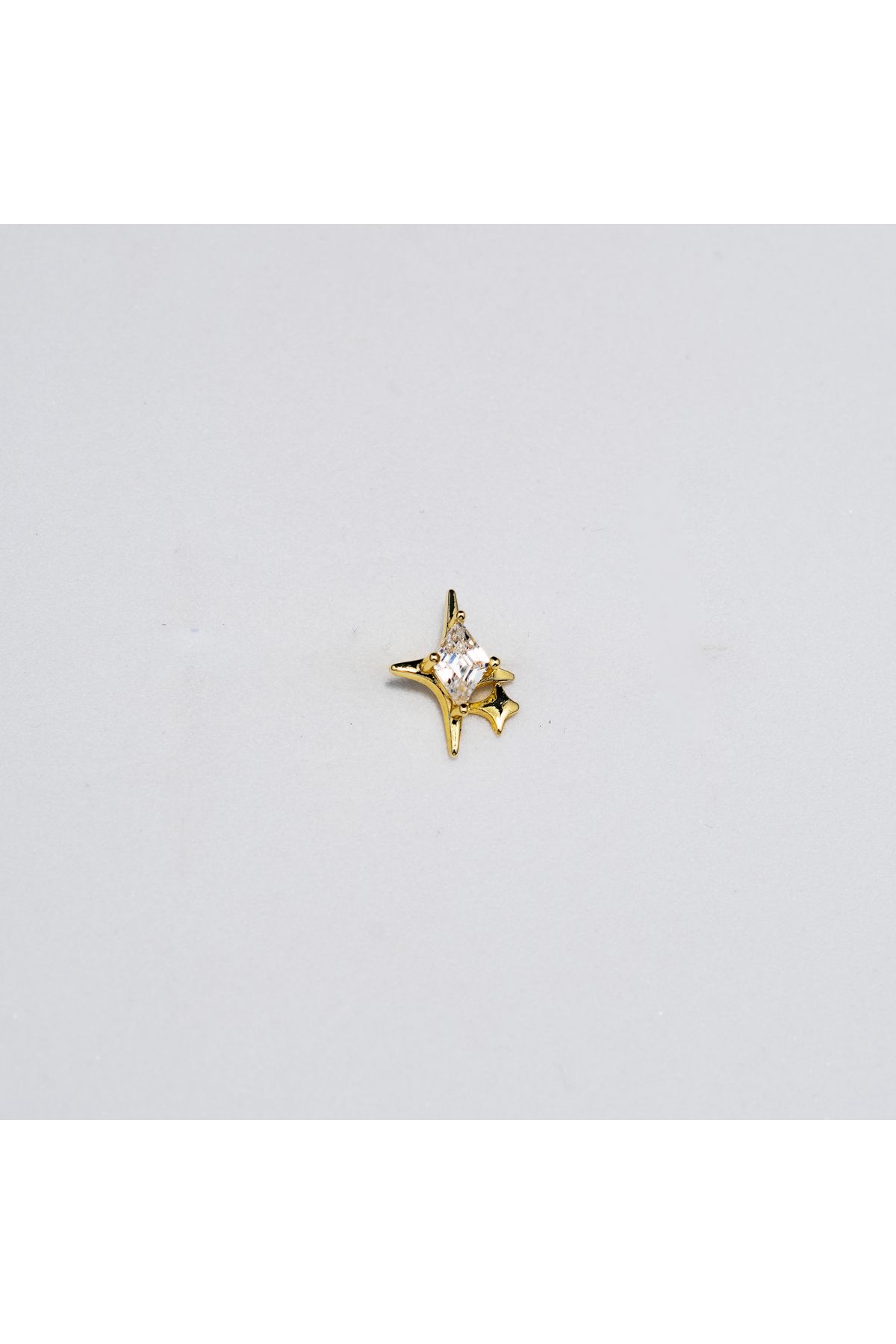 Piercing by Sever ŞEFFAF TAŞLI KUZEY YILDIZI ÇELİK PIERCING… ALTIN/GOLD RENKLİ (TARGUS HELIX CONCH FLAT)