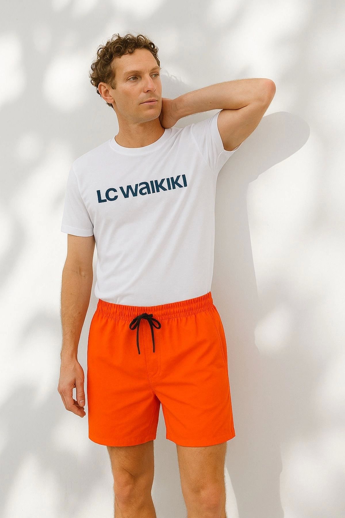 LC Waikiki LCWAIKIKI Regular Fit Kısa Boy Cepli File Astarlı Beli Bağcıklı Düz Hafif Kumaş Deniz Şortu
