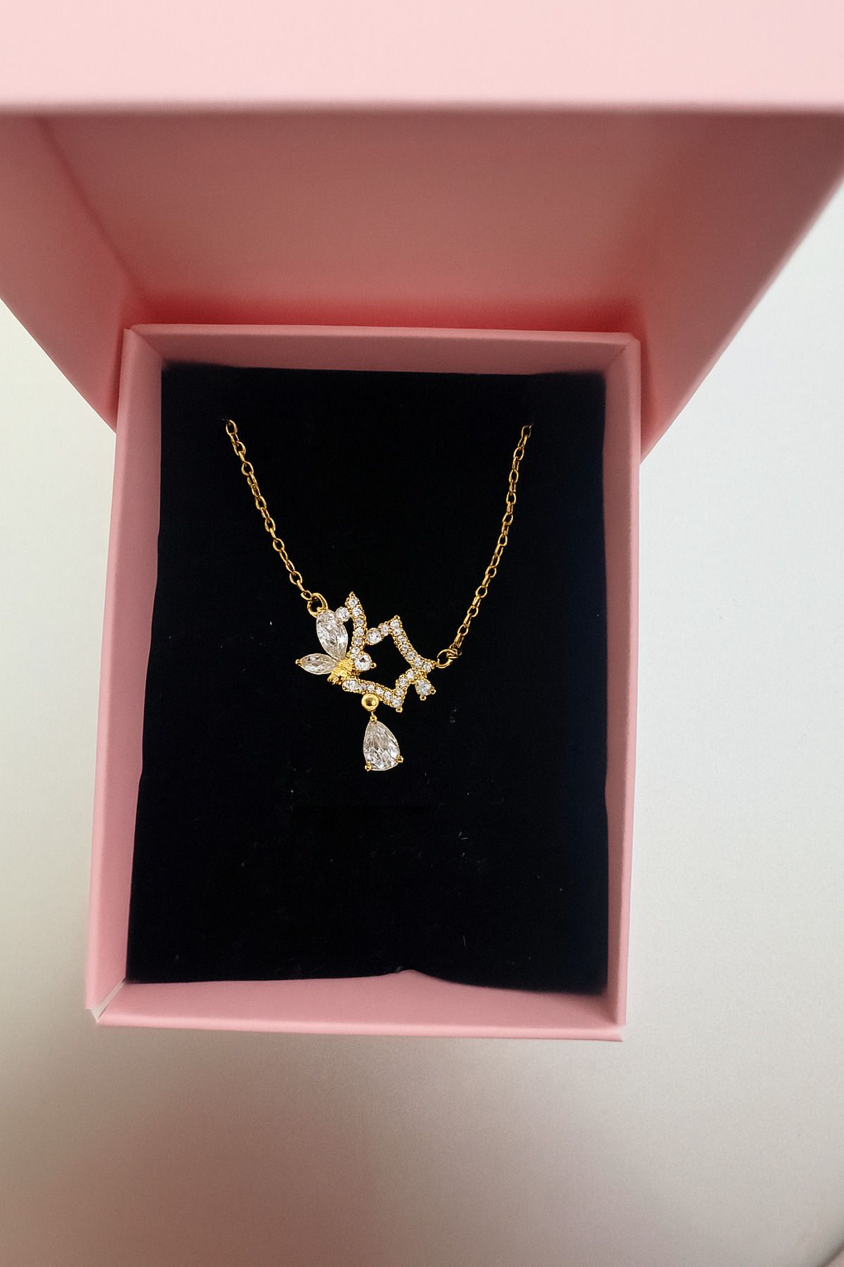 Butik yıldız detay çelik kolye