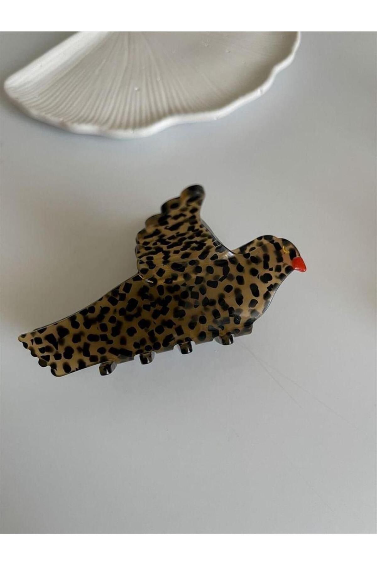 HİRA AKSESUAR LEOPAR DESENLİ KUŞ FİGÜRLÜ KEMİK TOKA