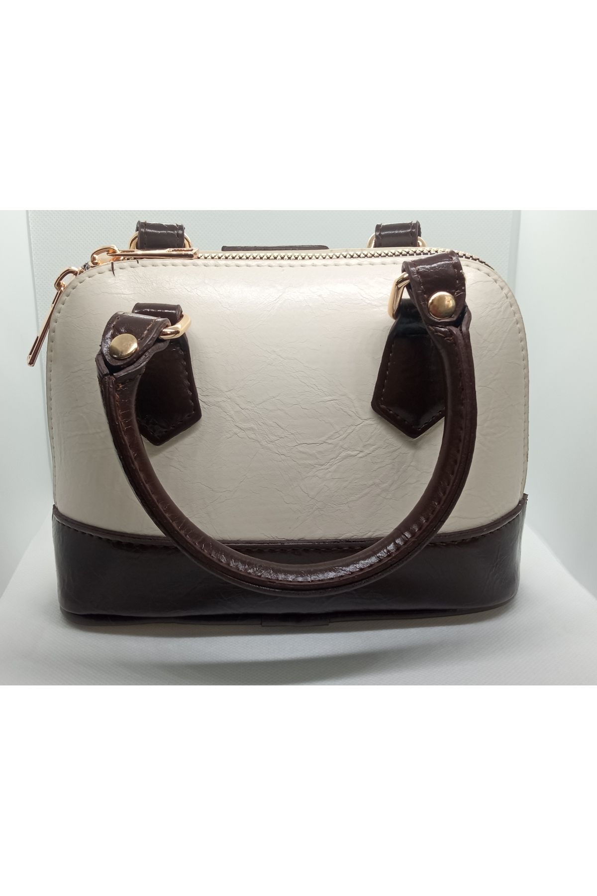 Erdem Acı kahve krem rengi çanta modelimiz en 20 cm boy 13 cm