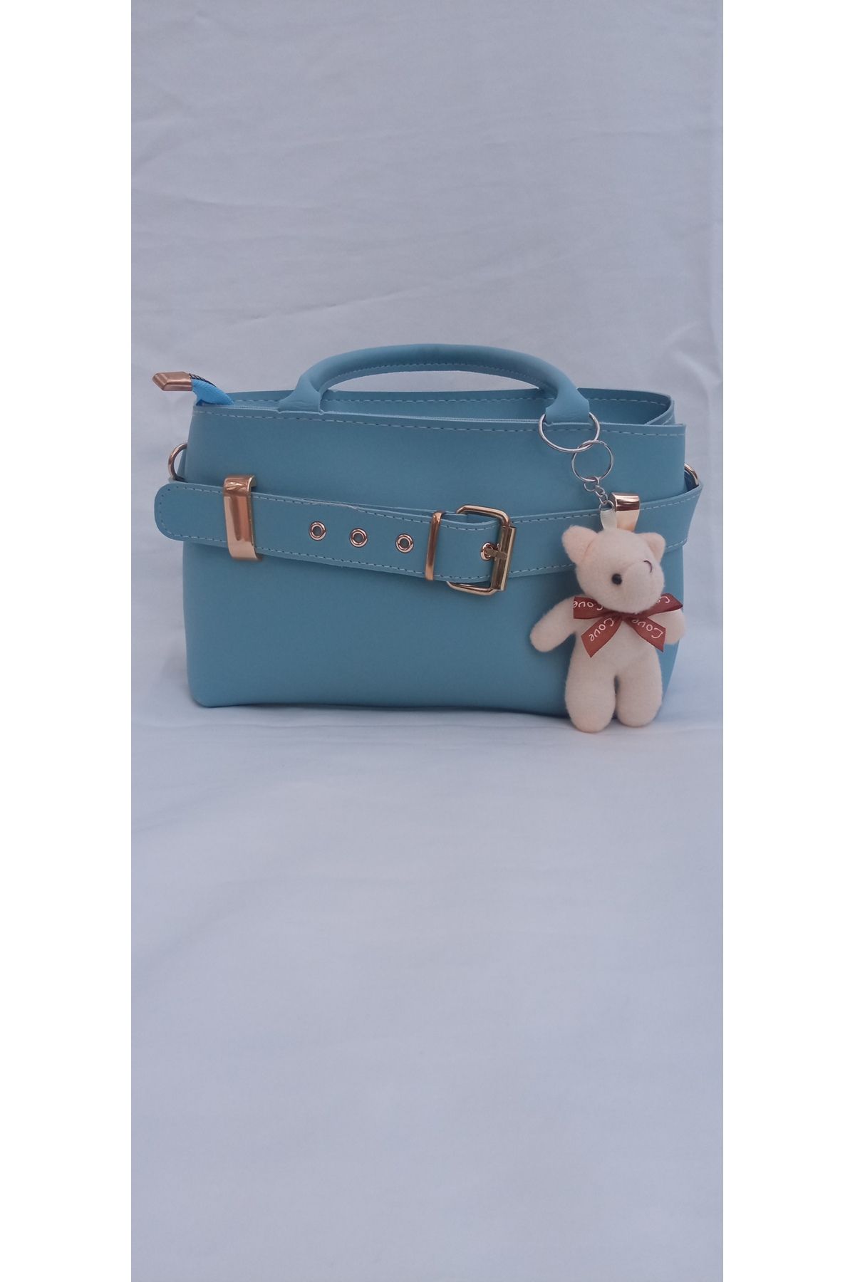Erdem Mavi aksesuar detaylı çanta modelimiz en 27 cm boy 15 cm
