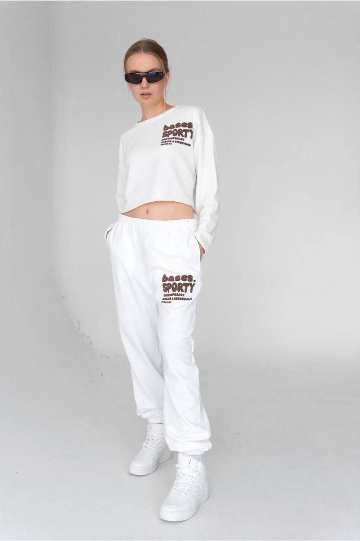 bases.-Jogger de damă cu talie ecru imprimat elastic 6