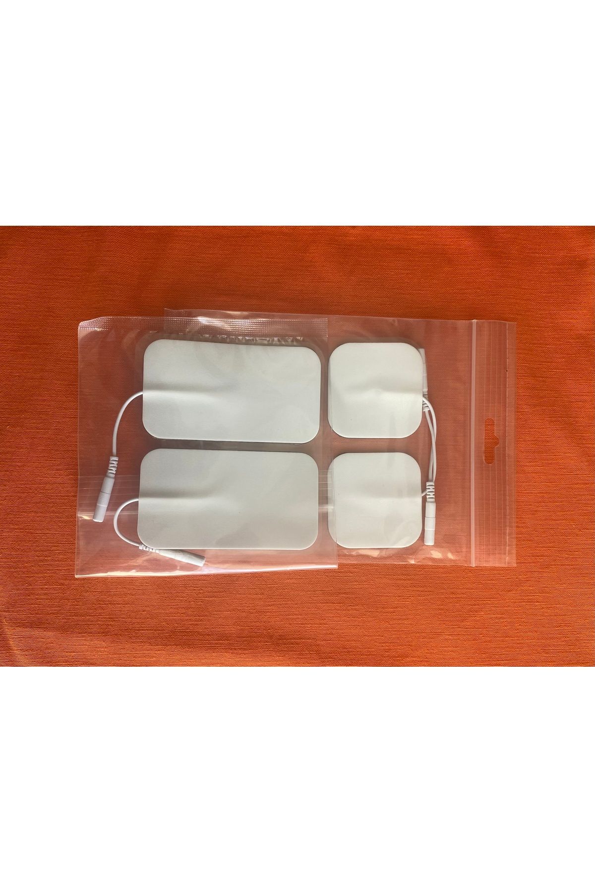 SEZİNCE Sezince TENS Elektrot Pedi 2 adet 5x9 cm 2 adet5x5 cm 1 paket 4 adet
