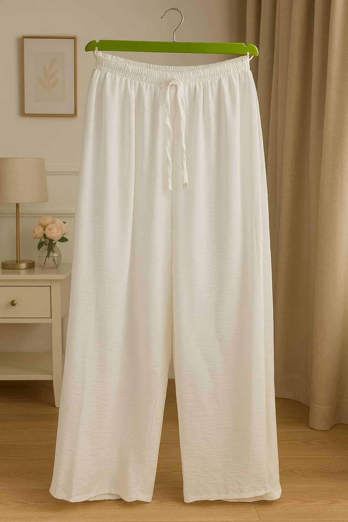 MU PRATOR kadın beli lastikli bol paça saten pantolon