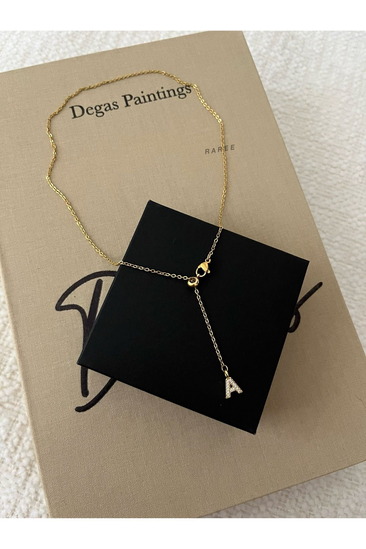 Raree Jewellery Asansörlü zirkon taşlı harf sallantılı çelik zincirli kolye