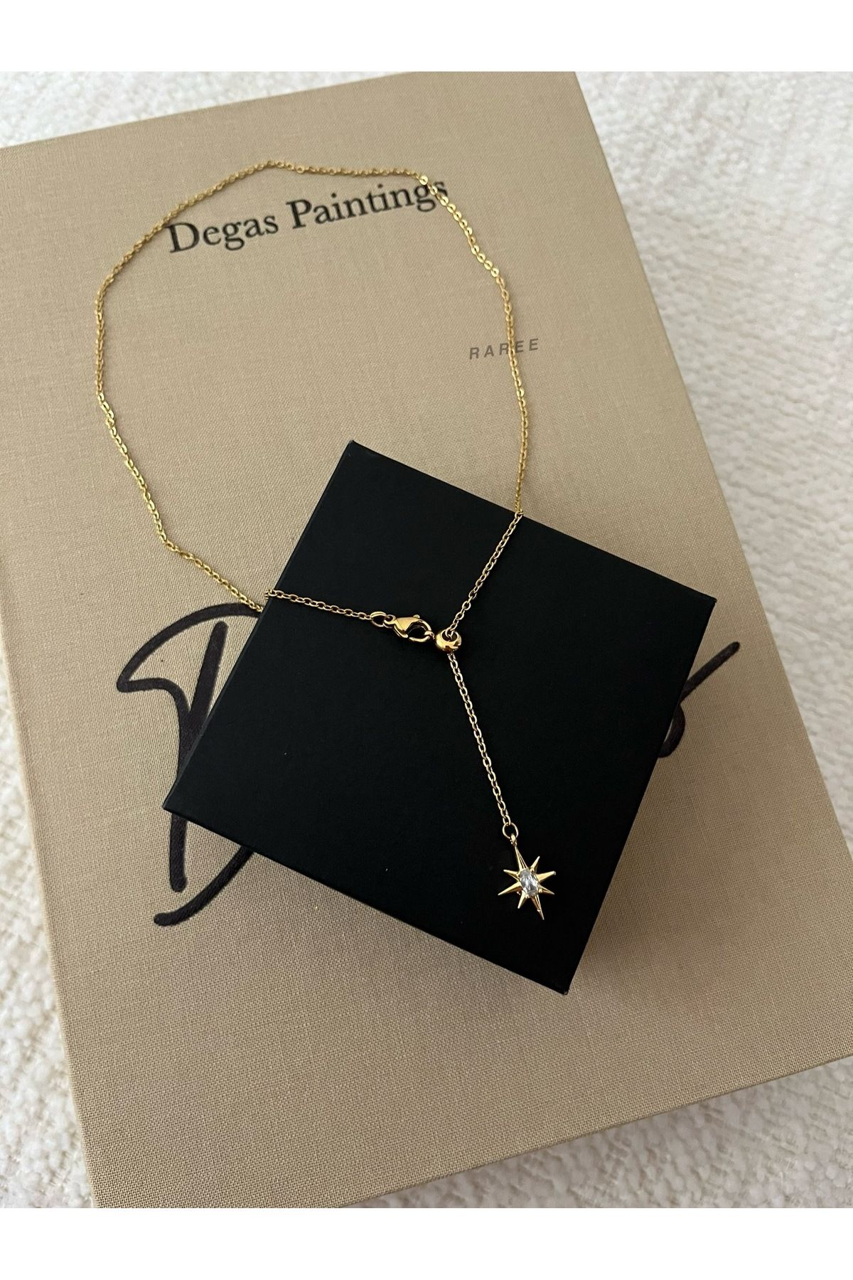 Raree Jewellery Asansörlü taşlı kuzey yıldızı sallantılı çelik zincirli kolye
