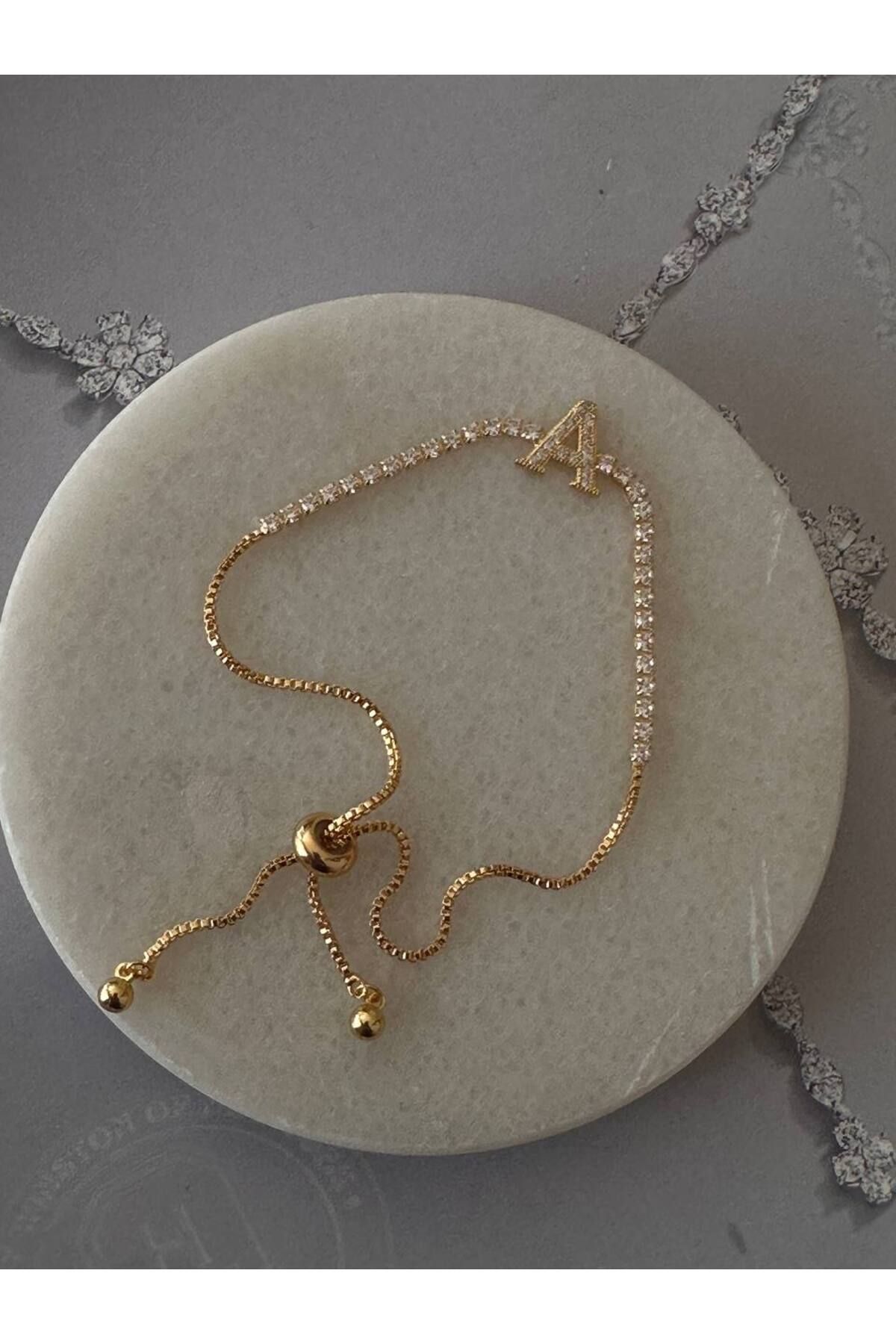 Esmeray Aksesuar Gold Renk Zirkon Taşlı Rodyum Kaplama ( A ) Harfli Su Yolu Asansör Bileklik