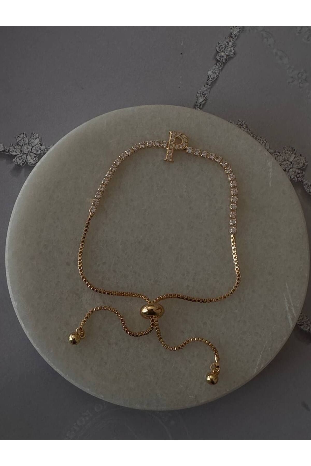 Esmeray Aksesuar Gold Renk Zirkon Taşlı Rodyum Kaplama ( P ) Harfli Su Yolu Asansör Bileklik