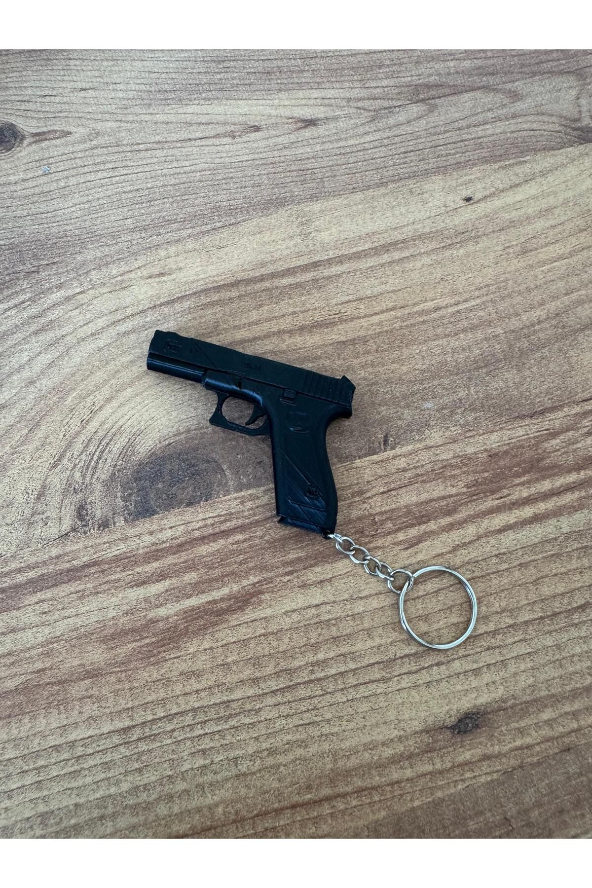 BatuBilge3d Tabanca Şeklinde Islıklı Anahtarlık | 3D Baskı PLA | 7x5 cm Dekoratif ve Fonksiyonel