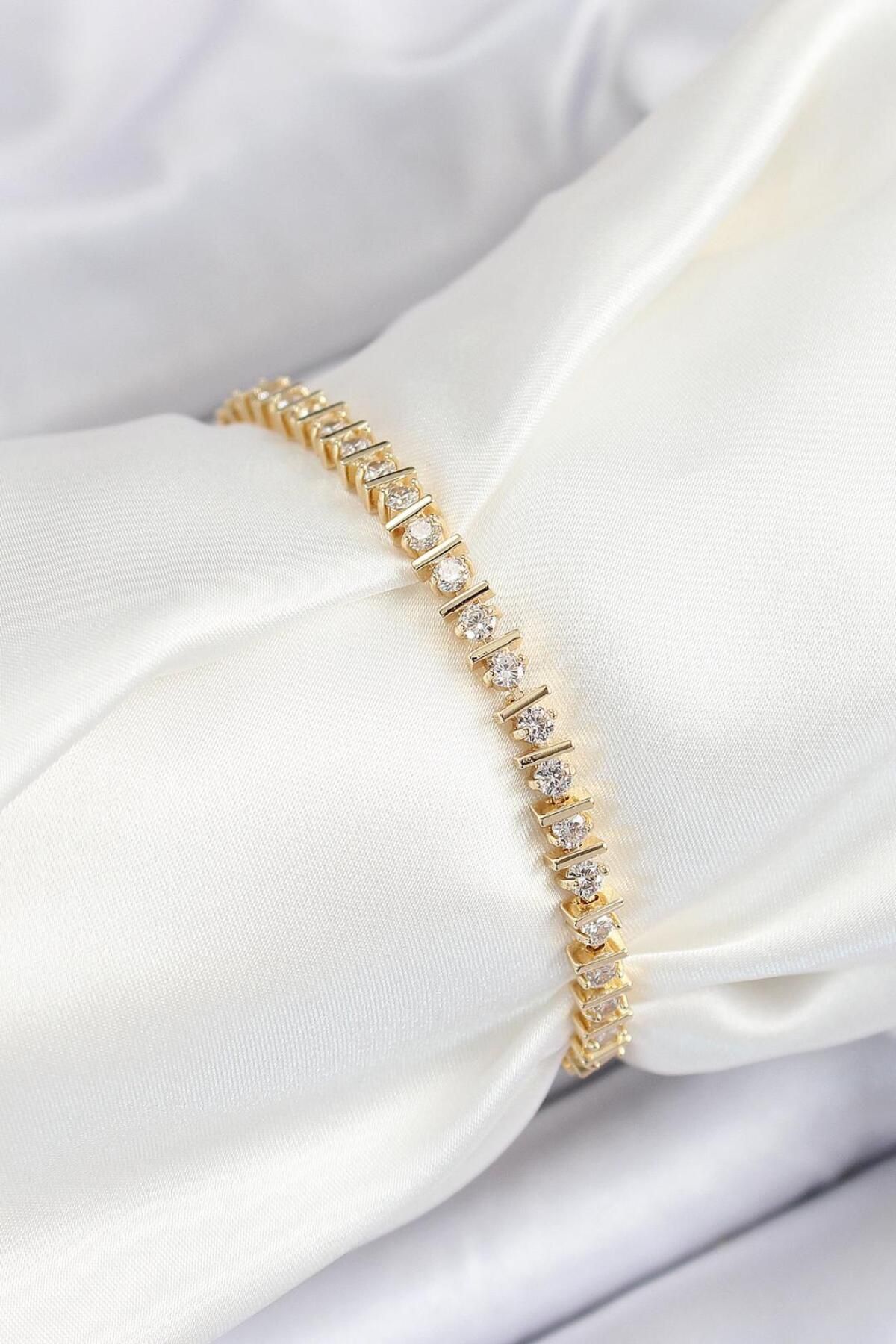 REBORN DESIGN Pirinç Sıralı Çit Model Zirkon Taşlı Gold Renk VIP Seri Kadın Bileklik