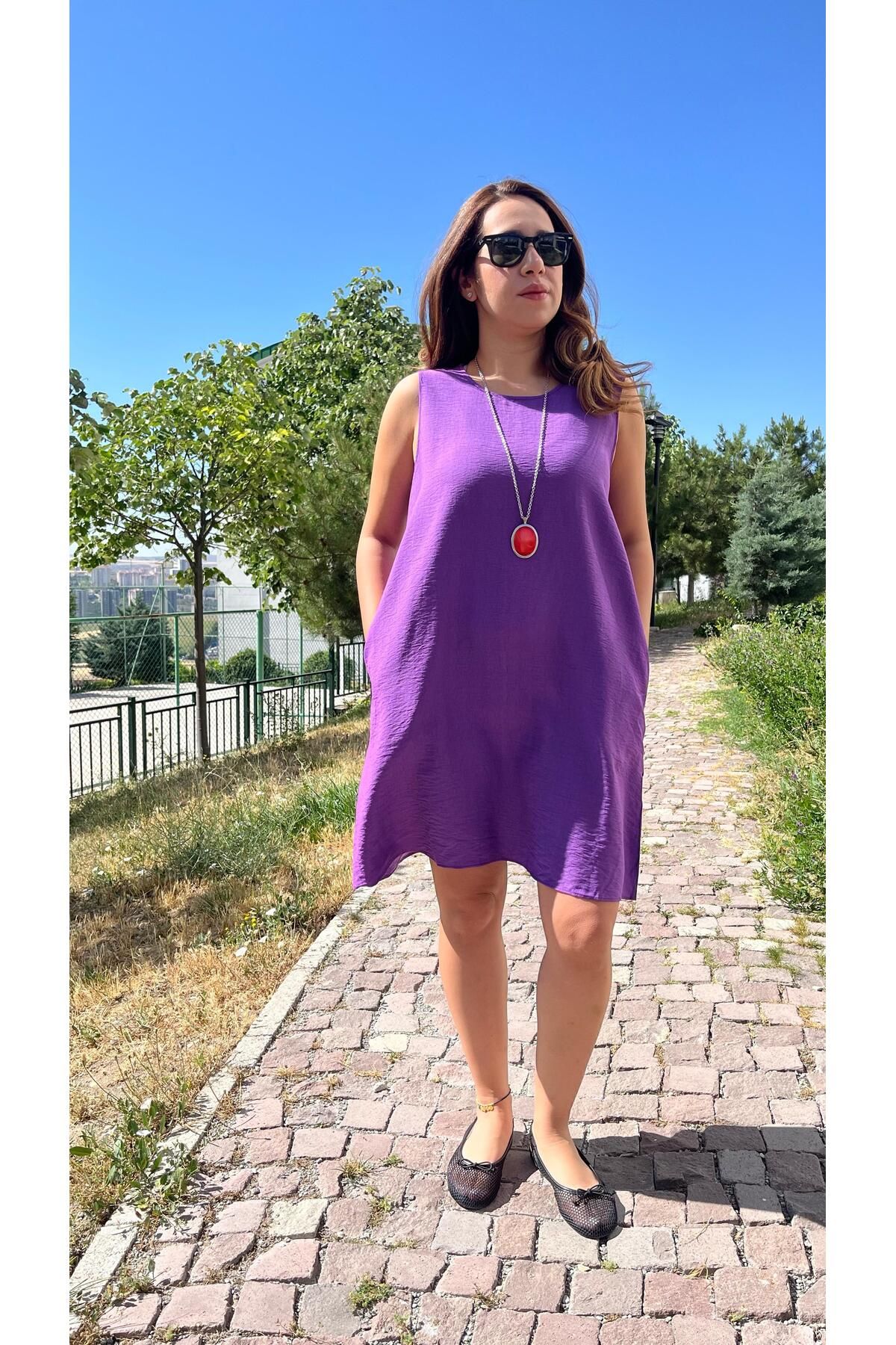 Gizybutik Cepli Müslin Kumaş Çan Elbise