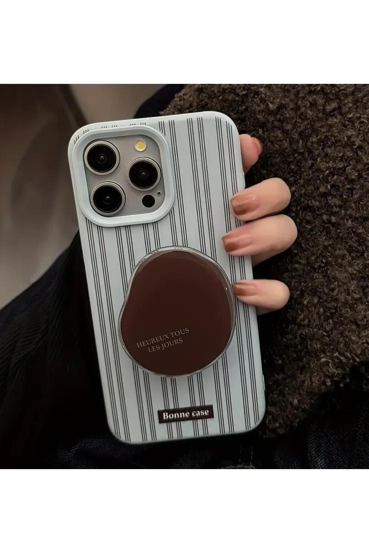 Burroe Atalier İphone16PRObebekmavisiüzerinekahvedikeyçizgilivekahveçekirdeğitutucuaparatlıtelefonkılıfı