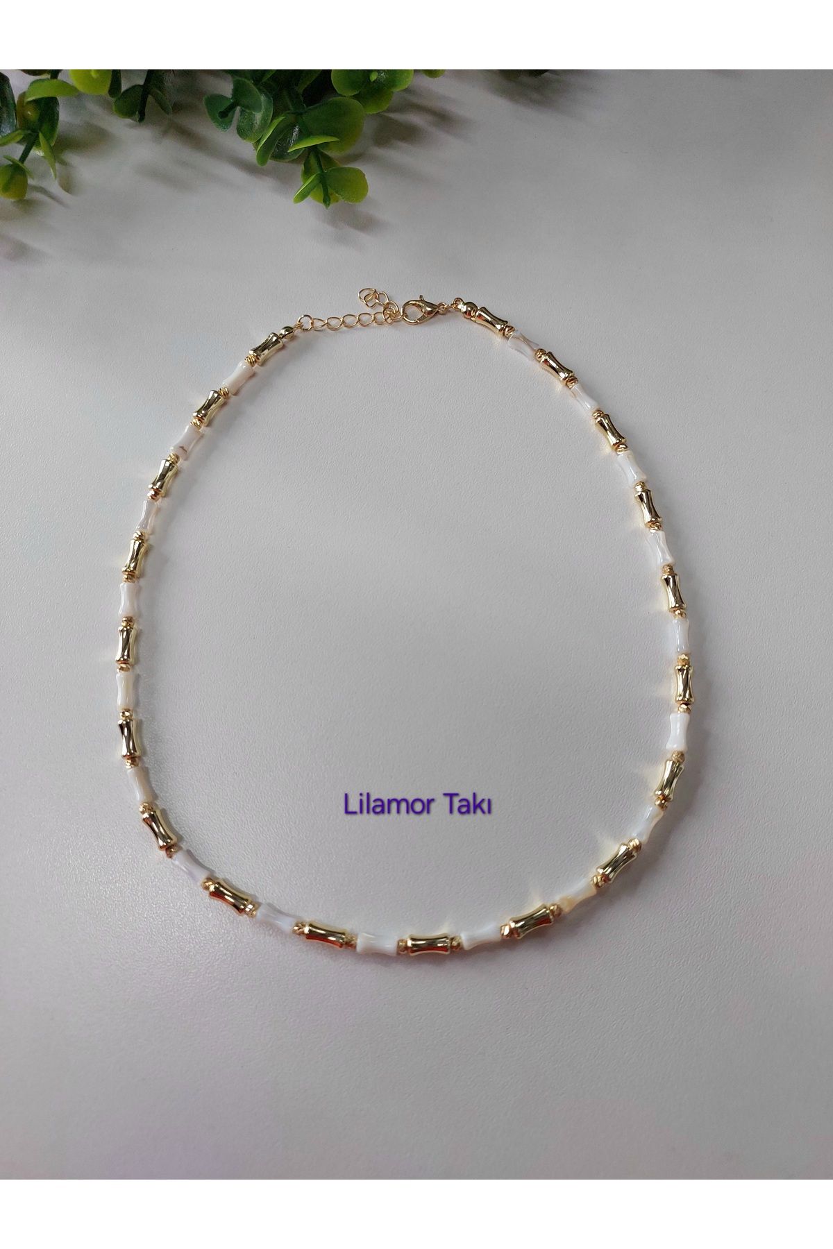 Lilamor Gold Renk ve Dorika Detaylı Beyaz Kemik Boncuk Kolye