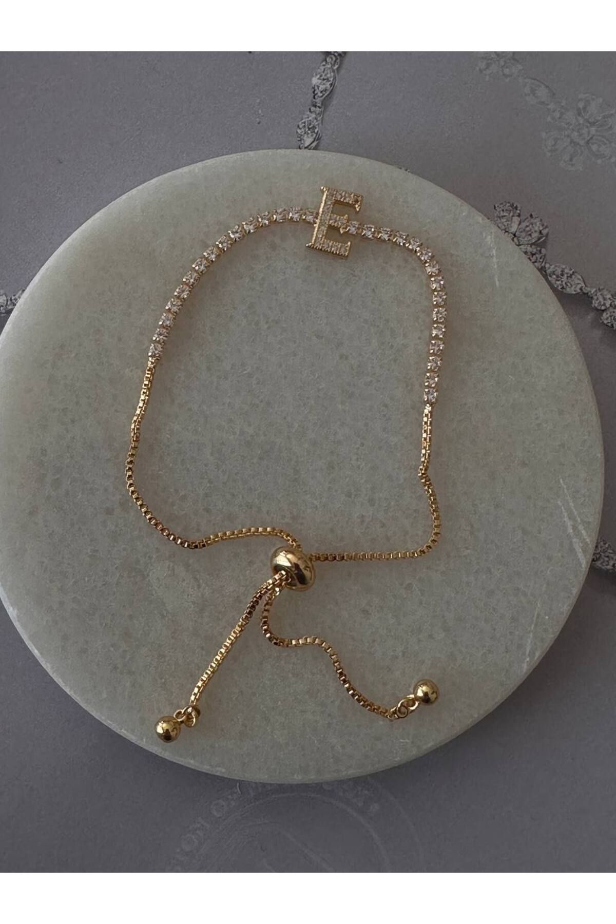 Esmeray Aksesuar Gold Renk Zirkon Taşlı Rodyum Kaplama ( E ) Harfli Su Yolu Asansör Bileklik