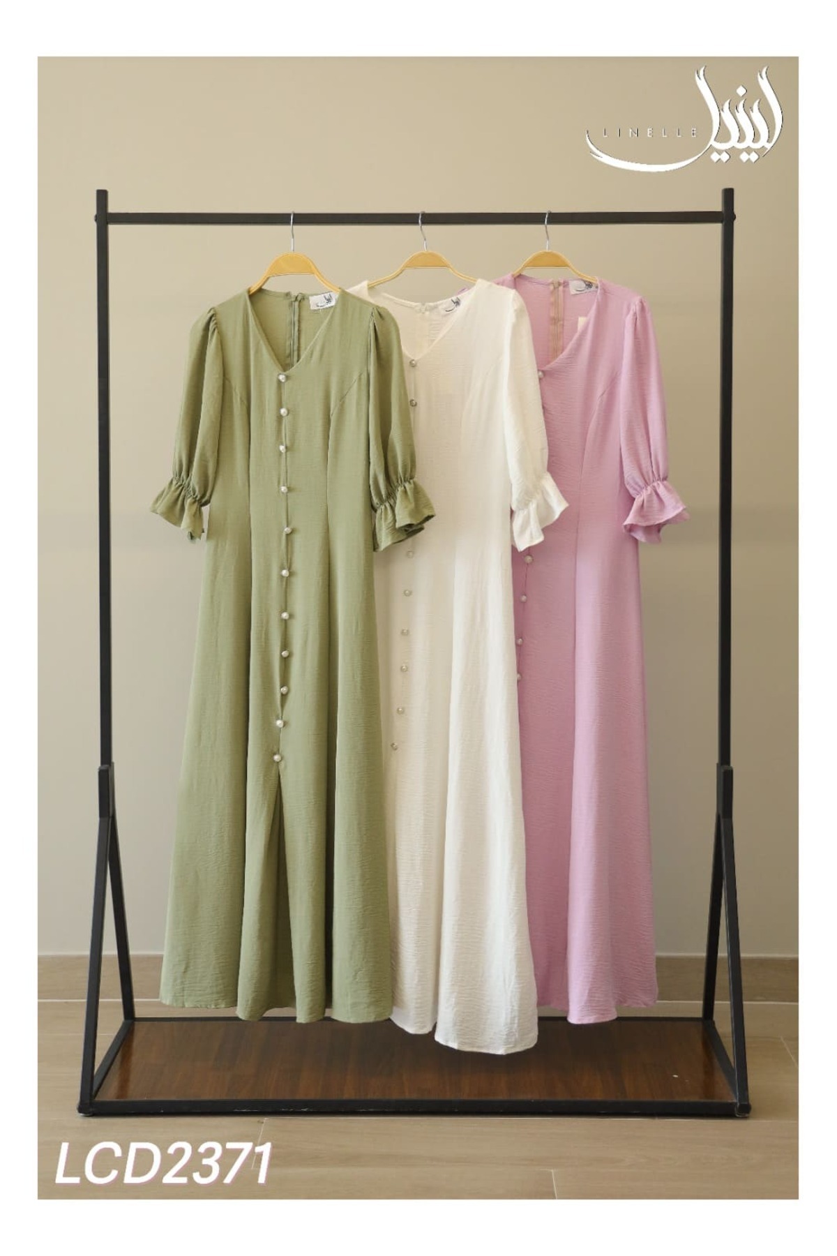 LINELLE-Casual Dress – Solid Color A-Line Maxi Dress with Statement Buttons and Ruffle Sleeves. 1