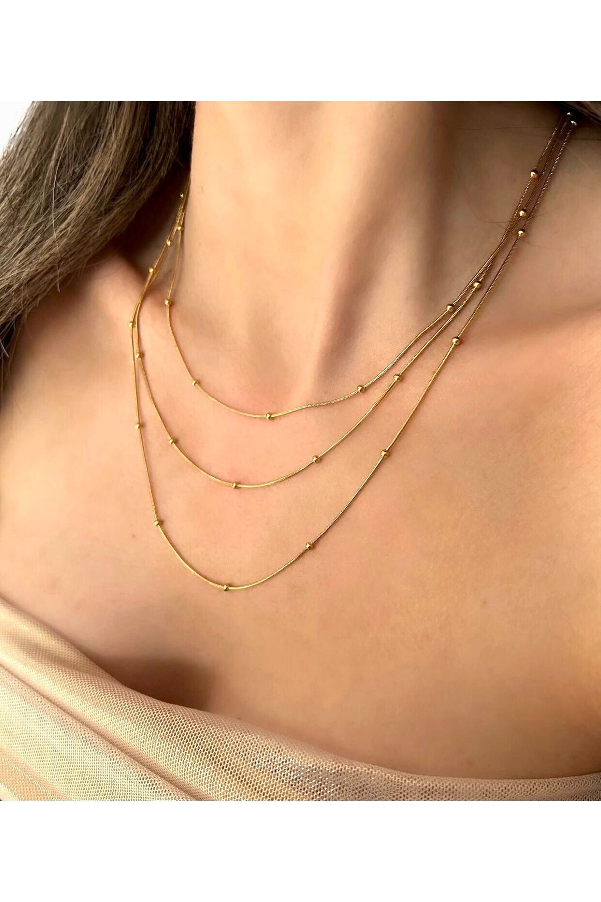 Manu Collection Kadın 3 katlı gold dorika kolye çelik kararmaz seri