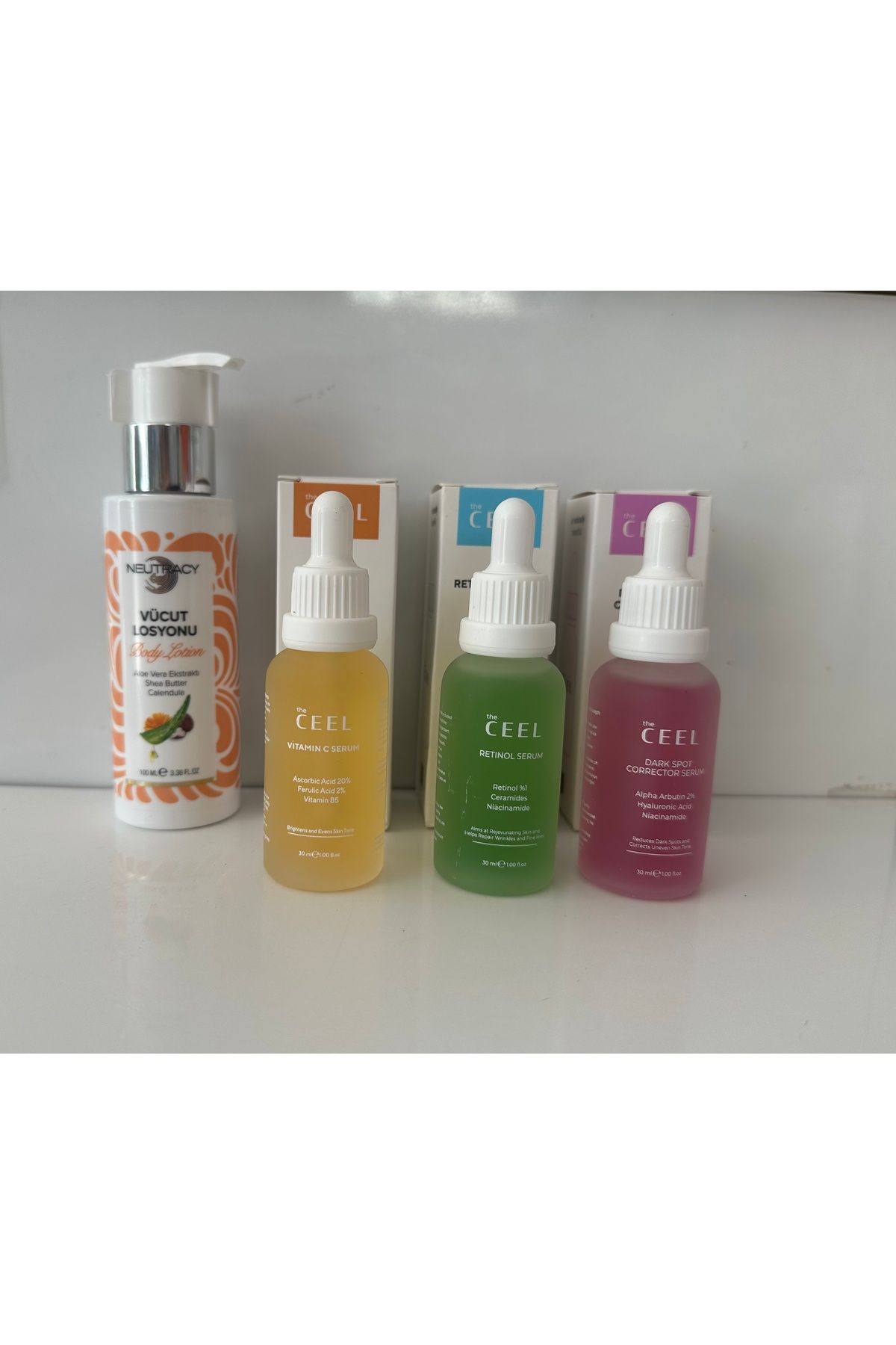 Ceel serum seti hediyeli ( leke .yaşlanma karşiti. c aydinlatıcı ) 2027)vücut losyonu hetiye)
