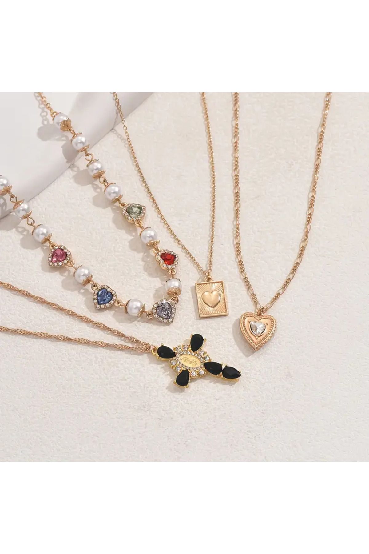 Carolina Jewelery İnci, kalp, haç ve parlak kalpli 4lü Kolye Seti