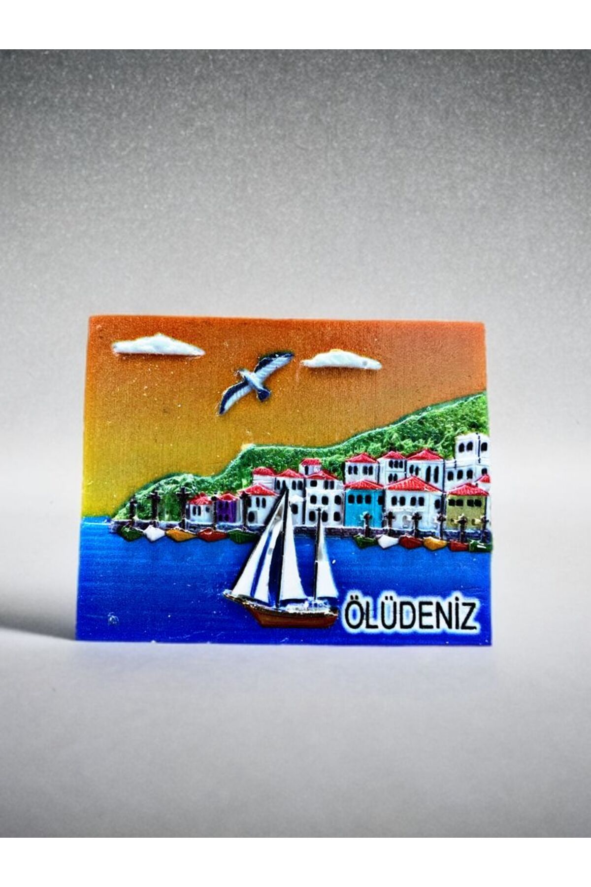 Home ÖLÜDENİZ Temalı Kabartma Polyester Magnet. 8cm x 7 cm.